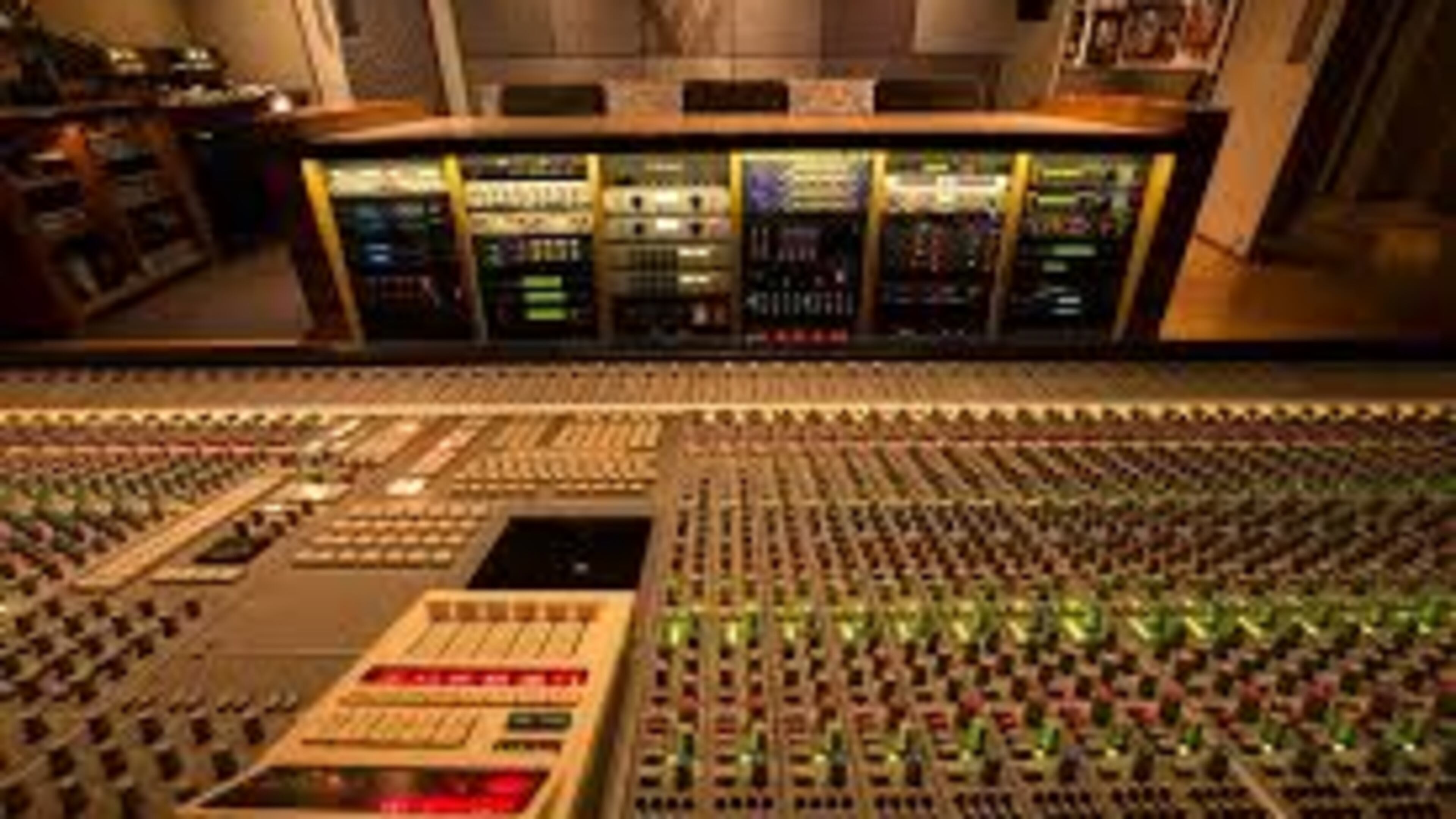 A Super Sound Studios employee exchanged gunfire with two armed men he saw entering the facility early Wednesday morning, police said.