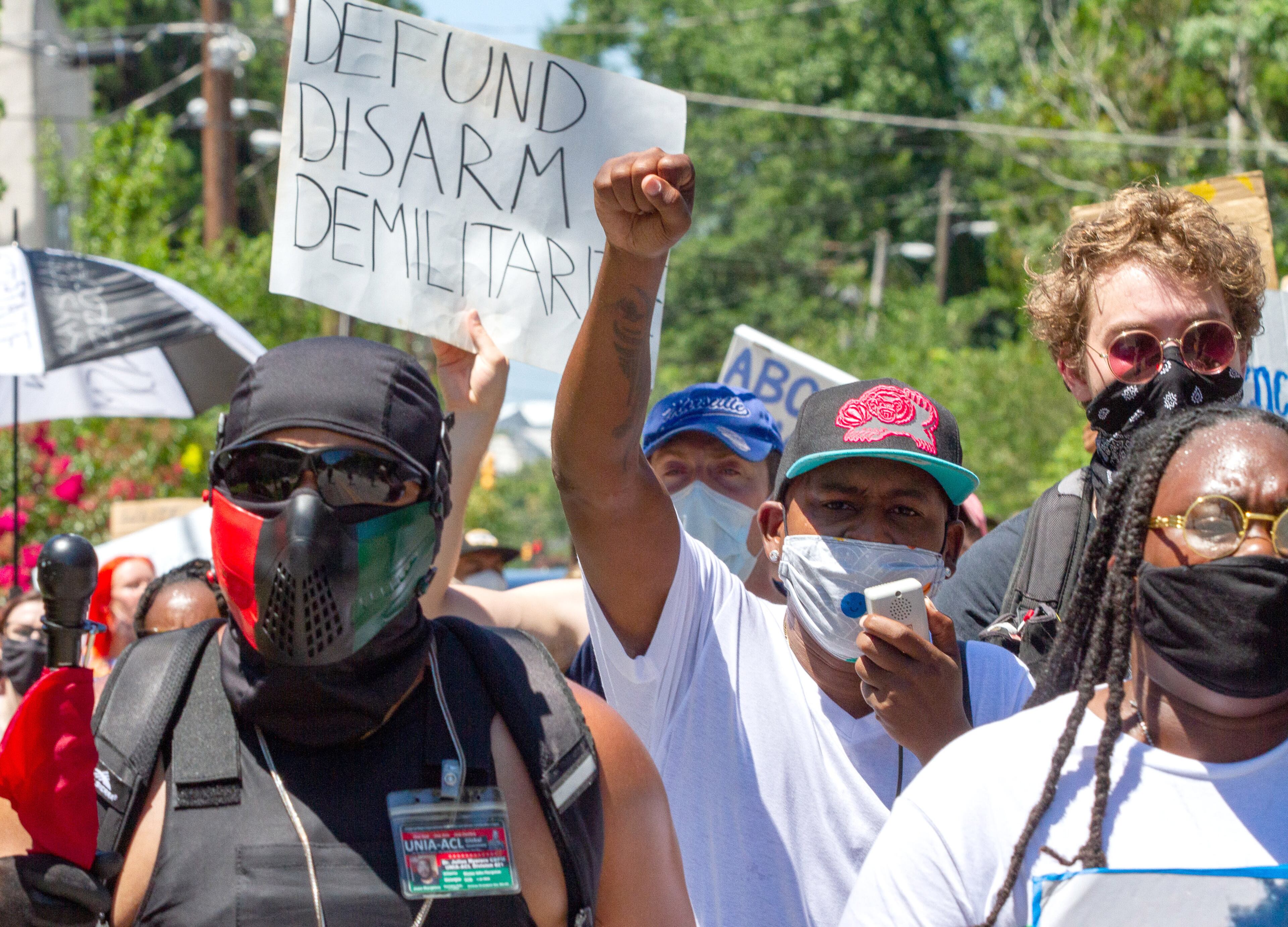 Protesters march along Rockwell Street as they head for the Wendy's on University Avenue during the 'Take Back the Wendy's' March & Rally in Atlanta on Saturday, July 11, 2020. The march started at the Community Movement Builders community house and ended at the Wendy's. STEVE SCHAEFER FOR THE ATLANTA JOURNAL-CONSTITUTION