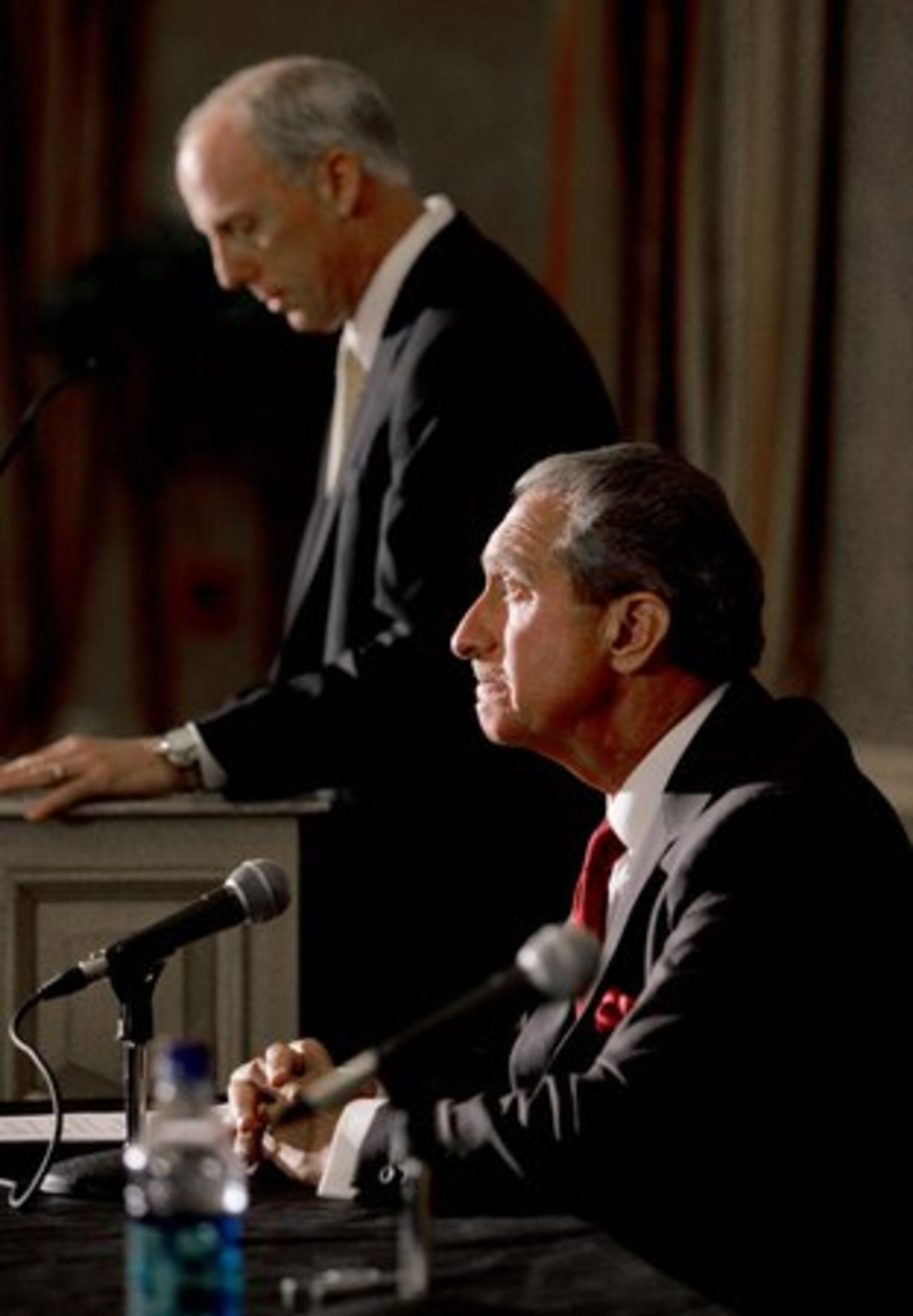 That same day, Falcons owner Arthur Blank and GM Rich McKay (background) held a press conference to discuss his response to the plea. Blank said he accepted Vick's apologies, some of which have been personal. But he added that he was "profoundly disappointed" in Vick and asserted the quarterback had damaged the reputation of the Falcons and the NFL and betrayed the trust of many people.