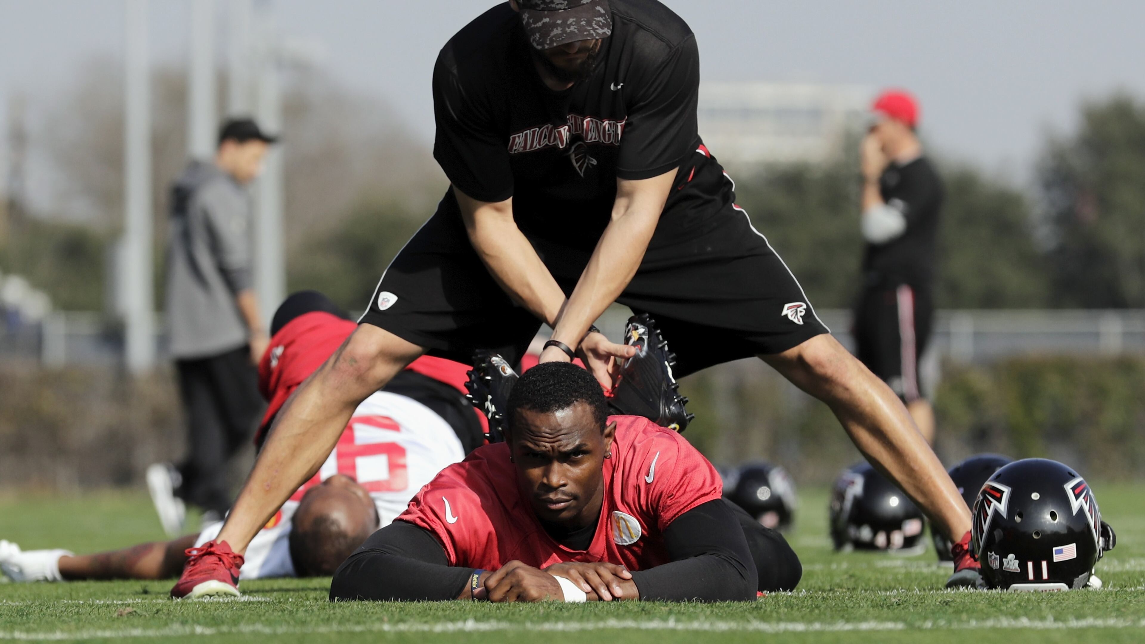 Falcons wide receiver Julio Jones stretches out before a Super Bowl practice Feb. 2, 2017, in Houston. (Tim Warner/Getty Images)