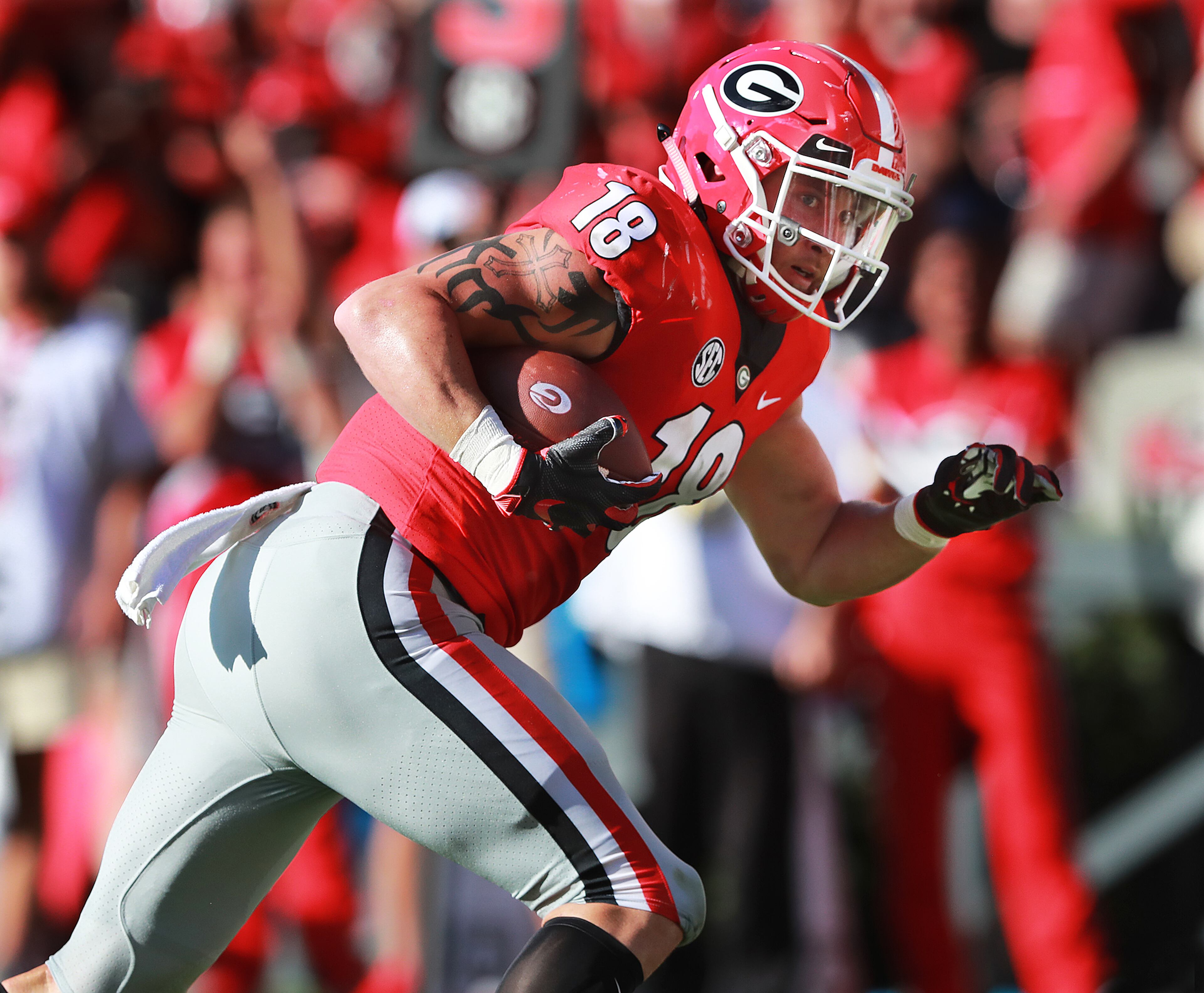 September 1, 2018 Athens: Georgia Bulldogs tight end Isaac Nauta goes for a touchdown on a reception from Justin Fields for a 45-0 lead Austin Peay during the second half in a NCAA college football game on Saturday, Sept 1, 2018, in Athens. Curtis Compton/ccompton@ajc.com