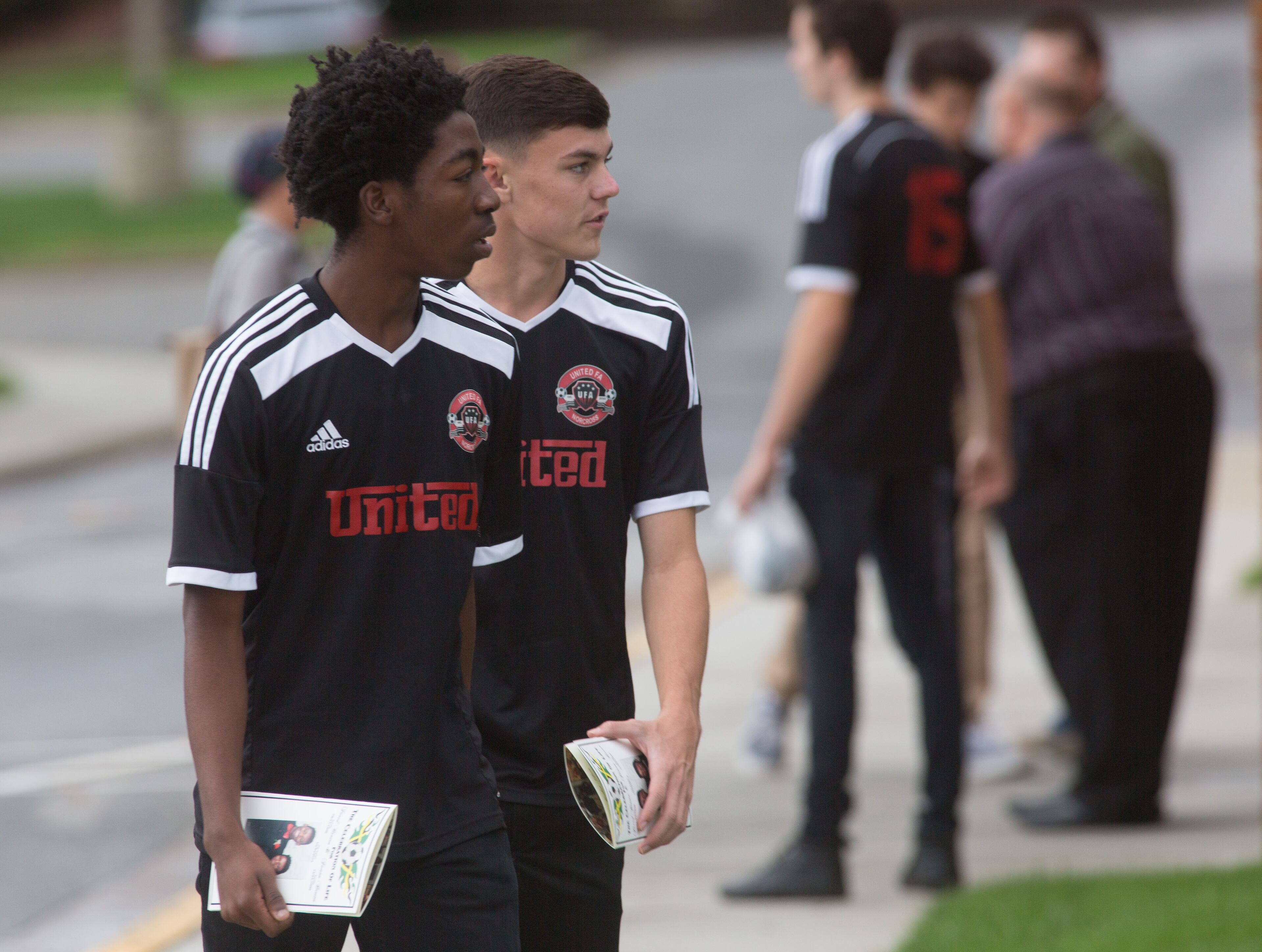 Students arrive at Lawrenceville Church of God for the funeral of 17-year-old Jared Brown and his 15-year-old brother Jaison who were killed in a car accident last week, Saturday, Nov. 7, 2015, in Lawrenceville, Ga. BRANDEN CAMP/SPECIAL