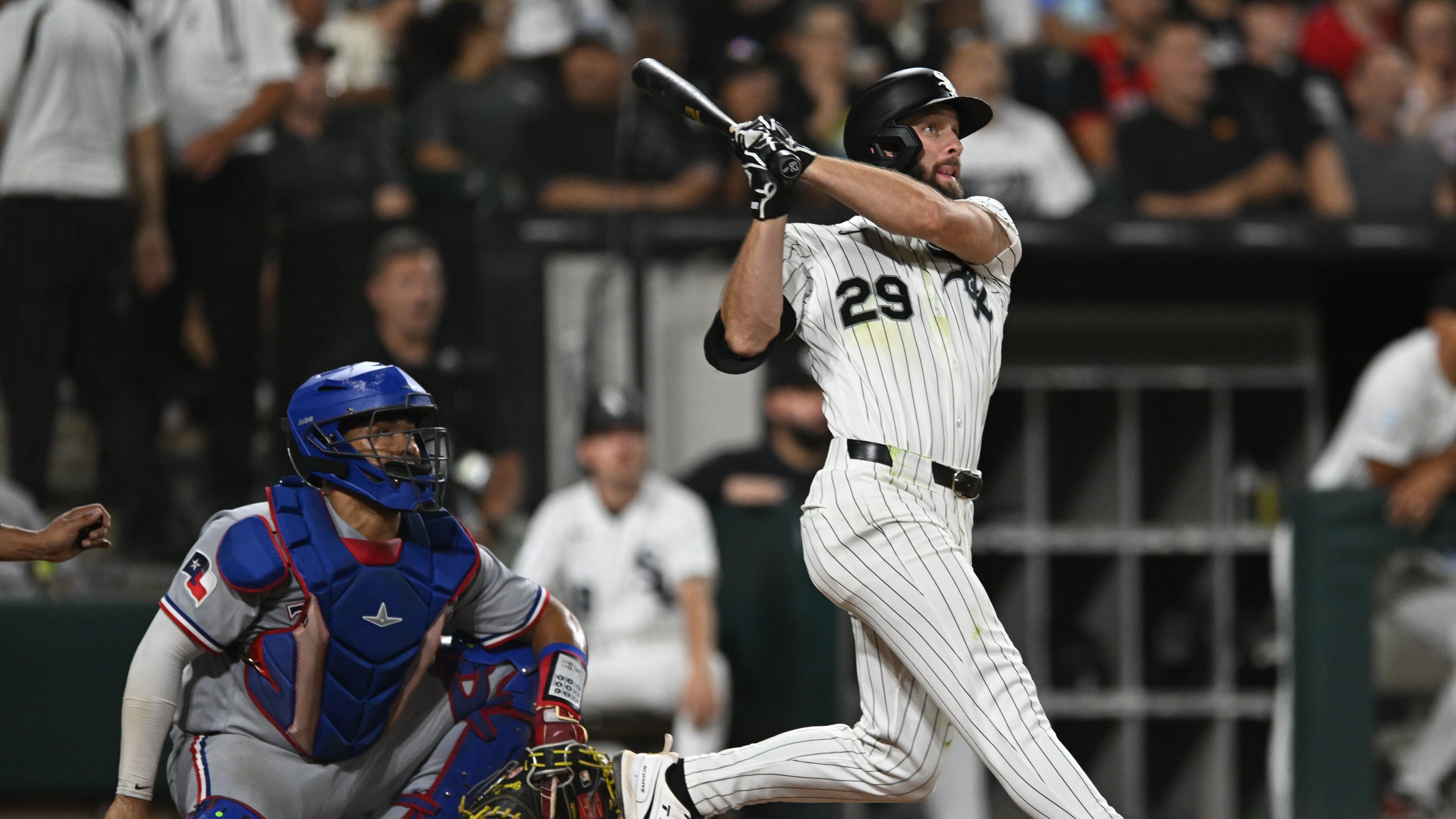Chicago White Sox's Tristan Peters watches his two-run home during the fifth inning of a baseball game against the Texas Rangers in Chicago, Wednesday, Aug. 26, 2026. (AP Photo/Paul Beaty)