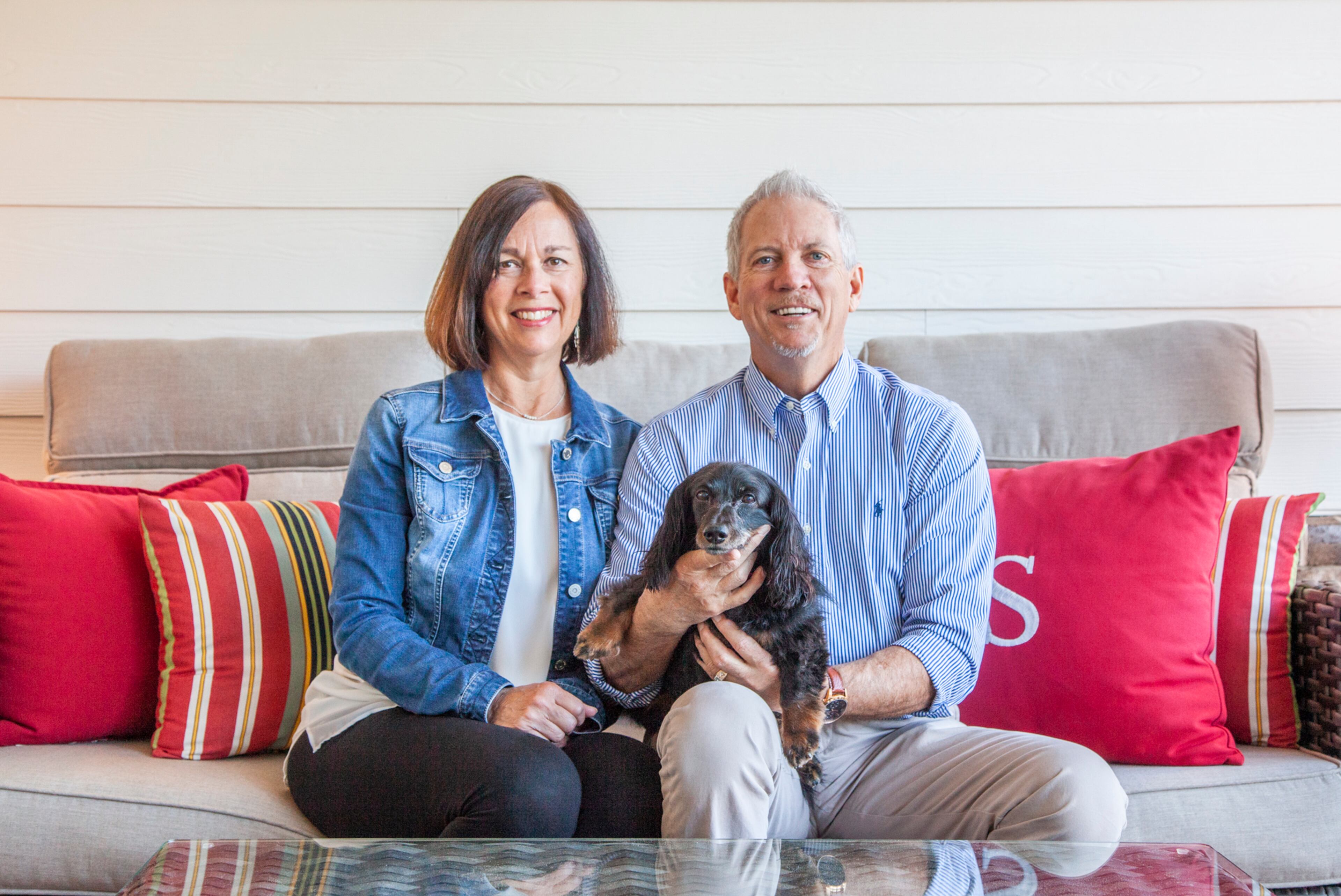 Mike and Renee Slaughter, along with their long-haired dachshund Mason, downsized to their new ranch home in 2018. Mike is director of discipleship at The Church of the Apostles and Renee is a real estate agent with Re/Max Unlimited. Text by Kat Khoury/Fast Copy News Service. Photo by Reann Huber.