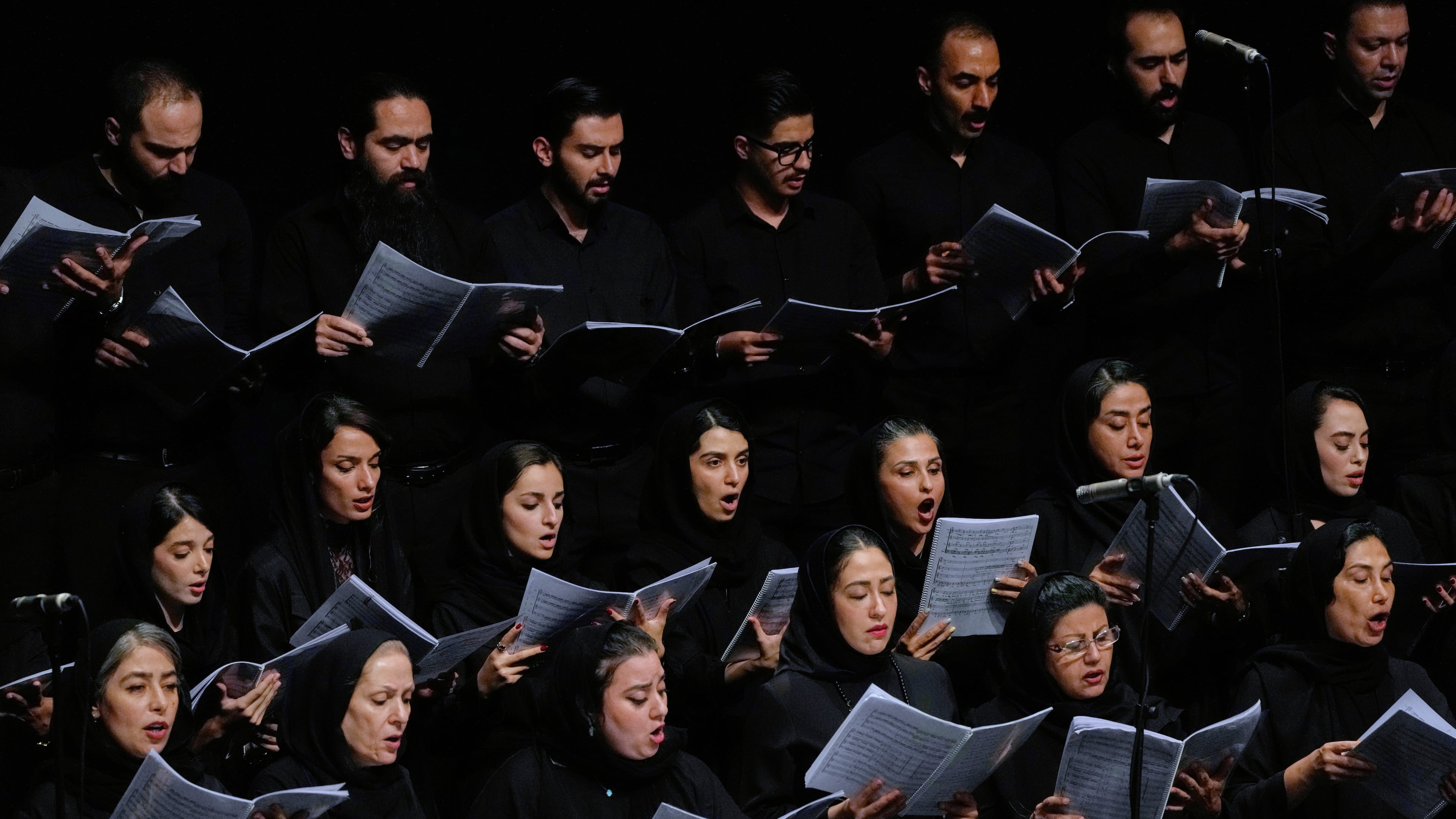 Choir performs in a Tehran Symphony Orchestra performance at Unity Hall in Tehran, Iran, Thursday, Aug. 6, 2026. (AP Photo/Vahid Salemi)