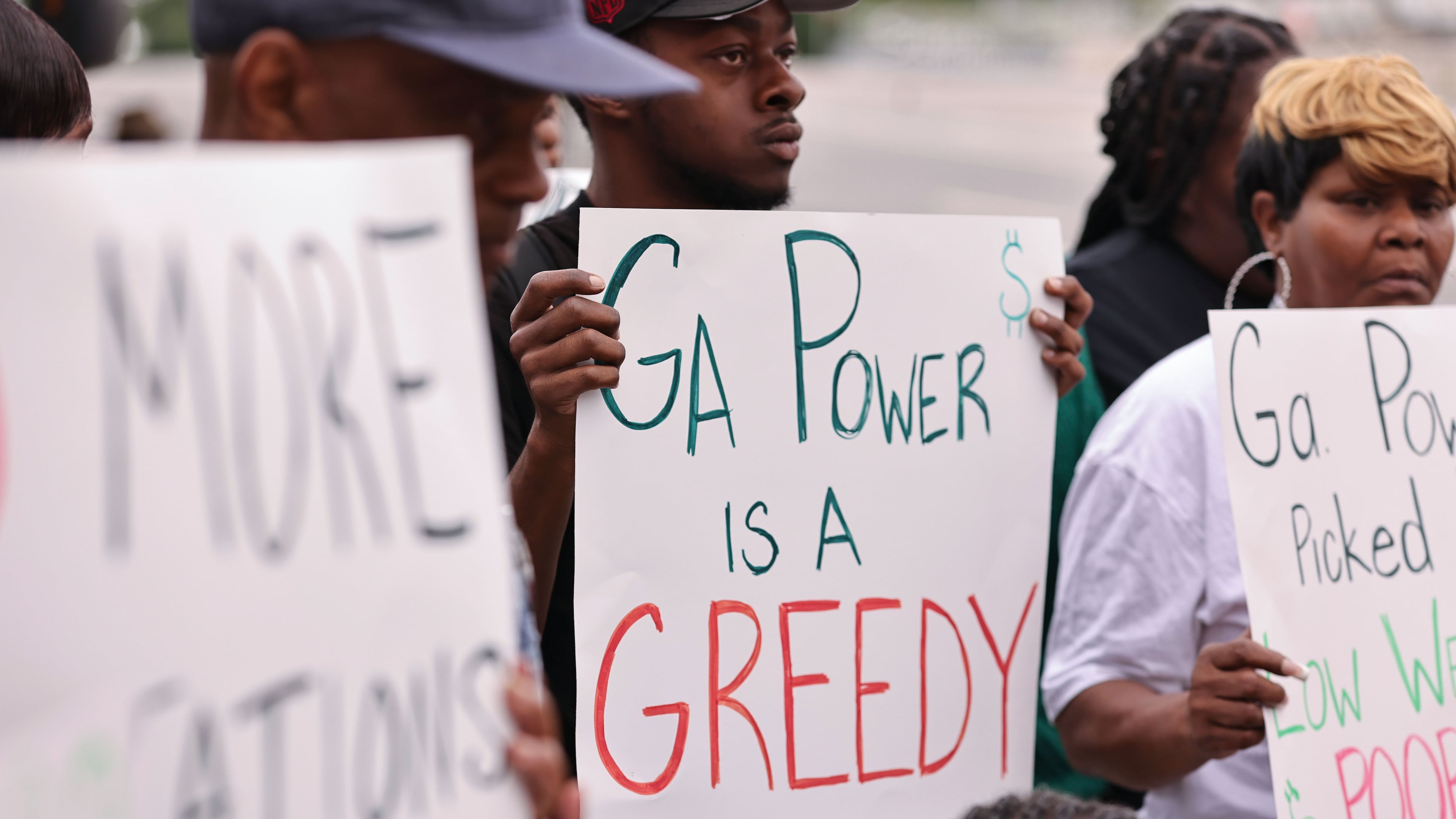 Vine City residents gather to rally against the new Georgia Power substation being built in the neighborhood in Atlanta on Thursday, June 5, 2025. (Natrice Miller/AJC)