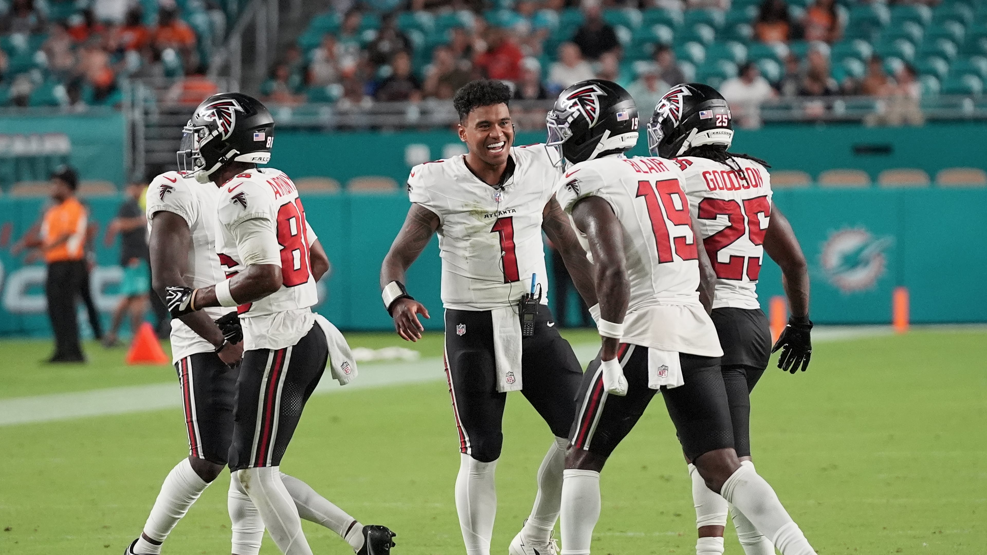 Atlanta Falcons quarterback Tua Tagovailoa (1) celebrates with teammates during the first half of an NFL preseason football game against the Miami Dolphins, Friday, Aug. 28, 2026, in Miami Gardens, Fla. (AP Photo/Lynne Sladky)