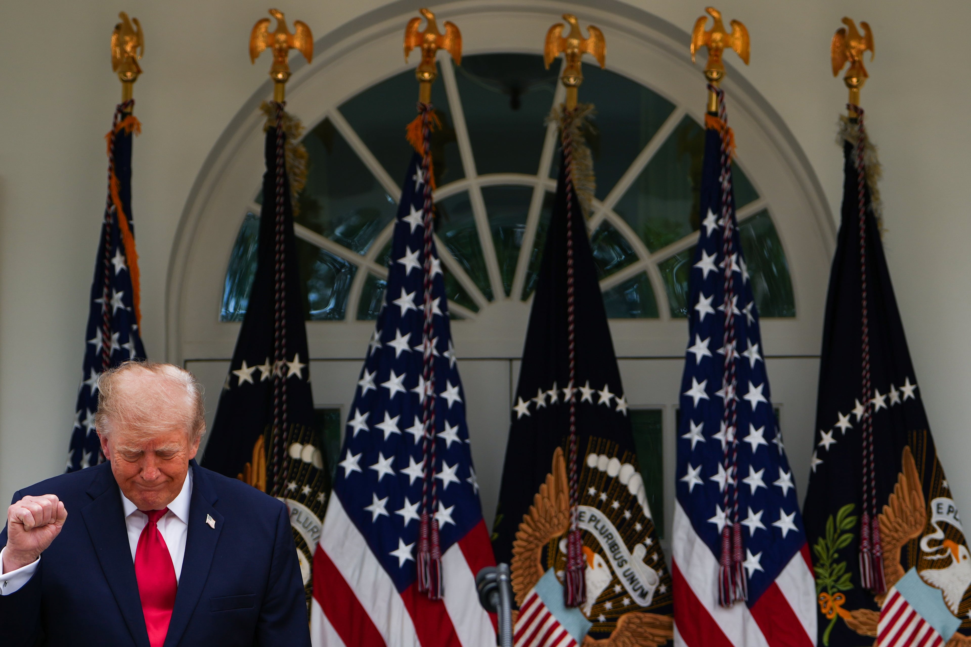 President Donald Trump arrives to speak at a lunch for first responders in the Rose Garden of the White House on Thursday. (Julia Demaree Nikhinson/AP)