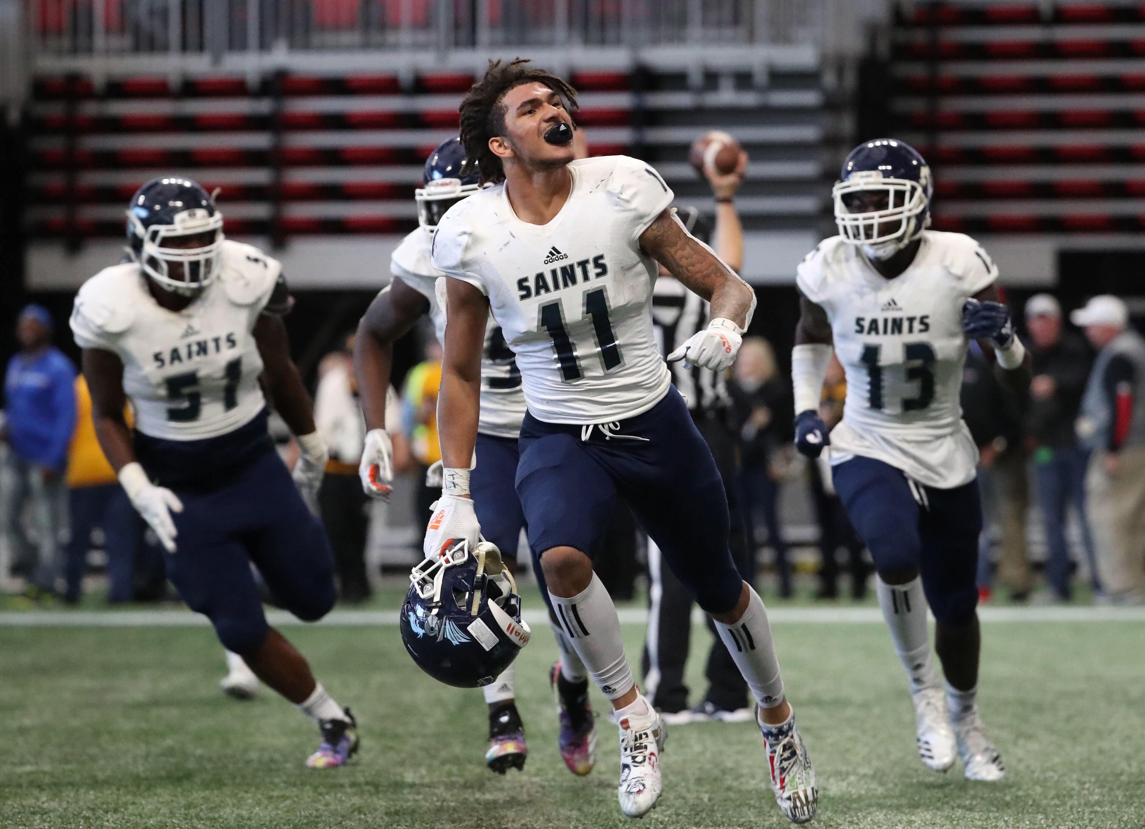 Jadon Haselwood reacts after catching the game-tying touchdown in the fourth quarter against Peach County during the Class AAA State Championship at Mercedes-Benz Stadium, Tuesday, December 11, 2018, in Atlanta. Cedar Grove would eventually win 14-13. (Jason Getz/Special to the AJC)