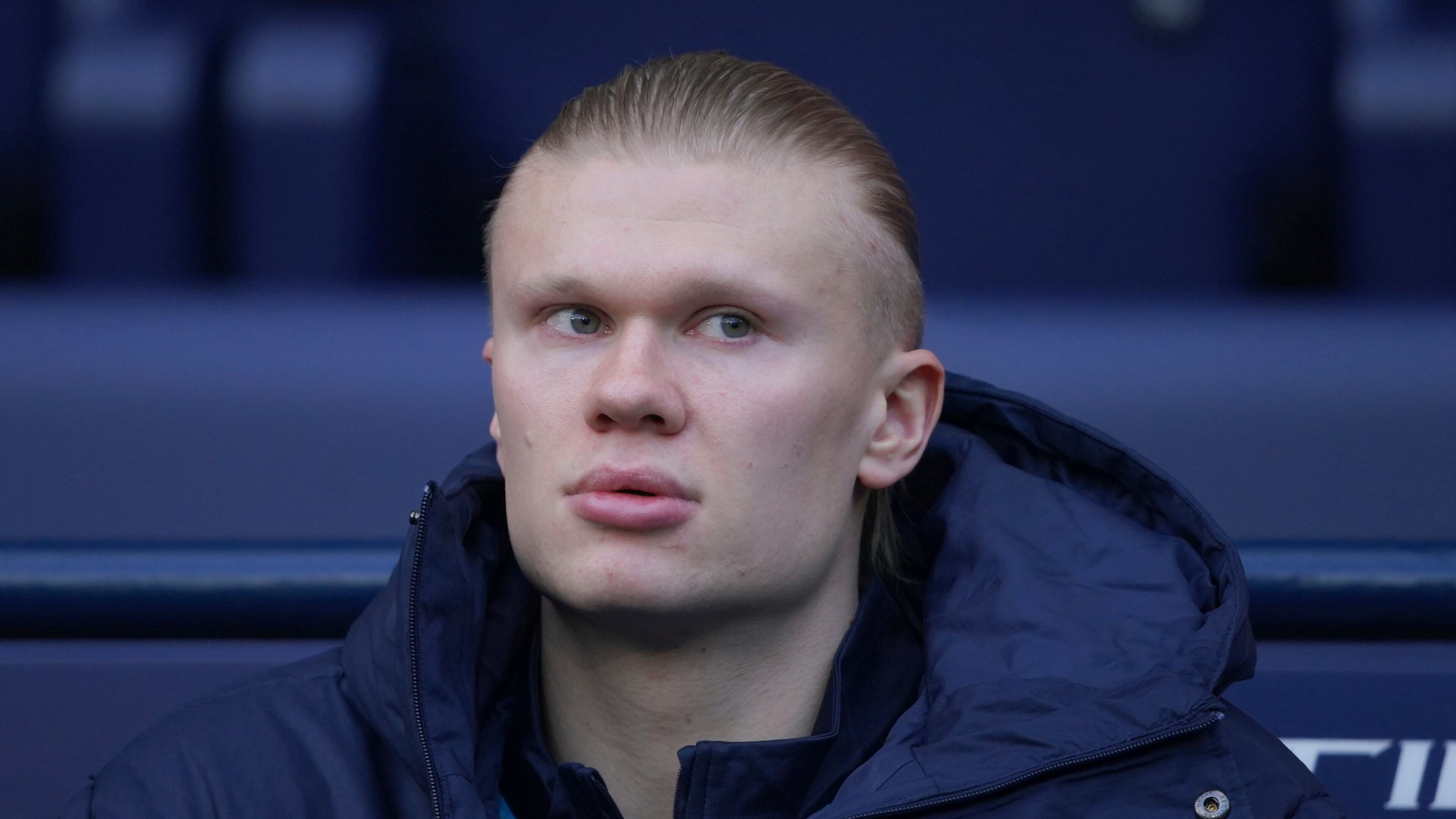 Manchester City's Erling Haaland sits in the dug out before the start of the English Premier League soccer match between Manchester City and Wolverhampton Wanderers in Manchester, England, Saturday, Jan. 24, 2026. (AP Photo/Ian Hodgson)
