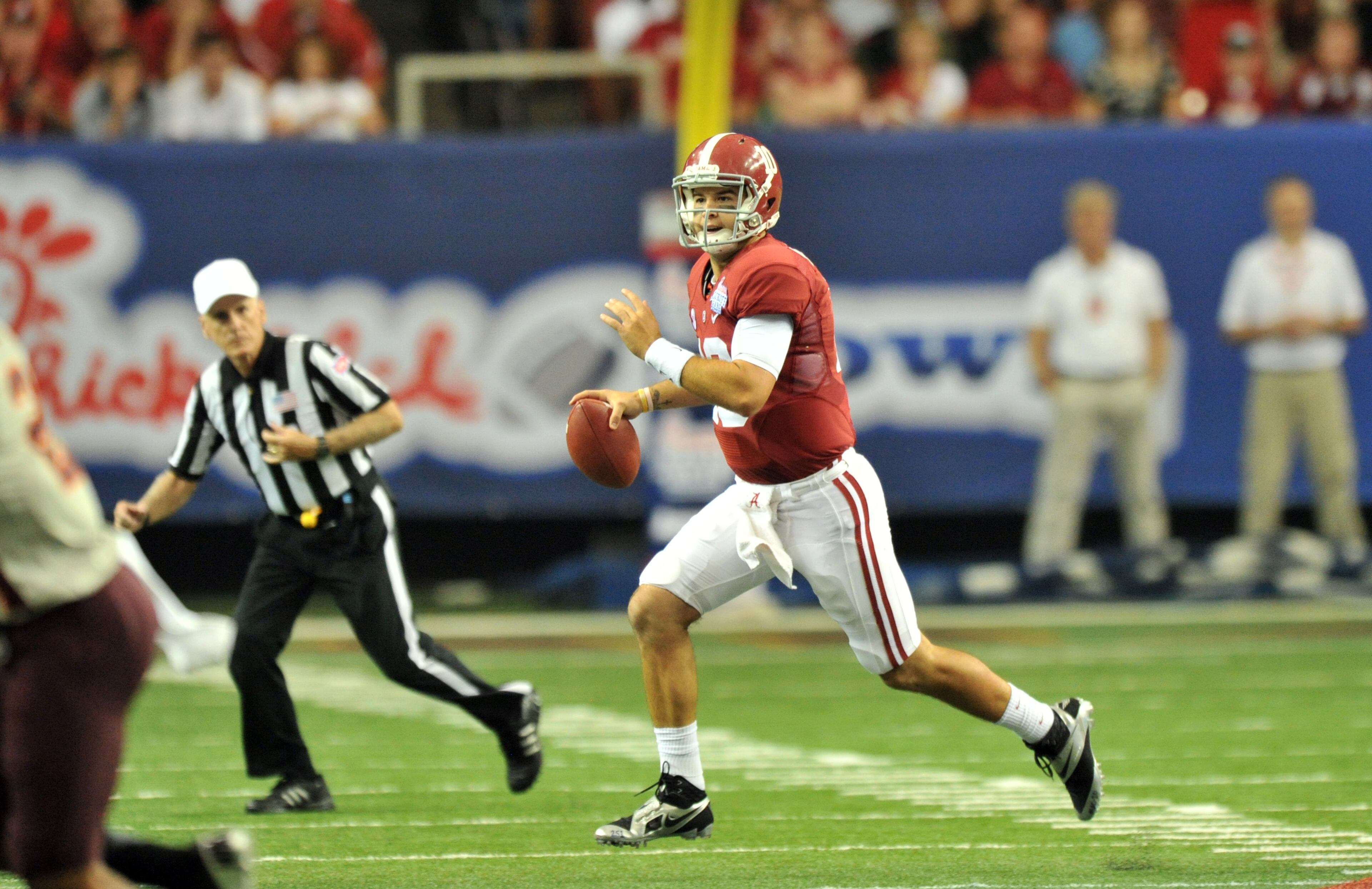 Alabama Crimson Tide quarterback AJ McCarron (10) prepares to throws a pass in the first half of Chick-fil-A Kickoff Classic against the Virginia Tech Hokies at Georgia Dome on Saturday, August 31, 2013. HYOSUB SHIN / HSHIN@AJC.COM