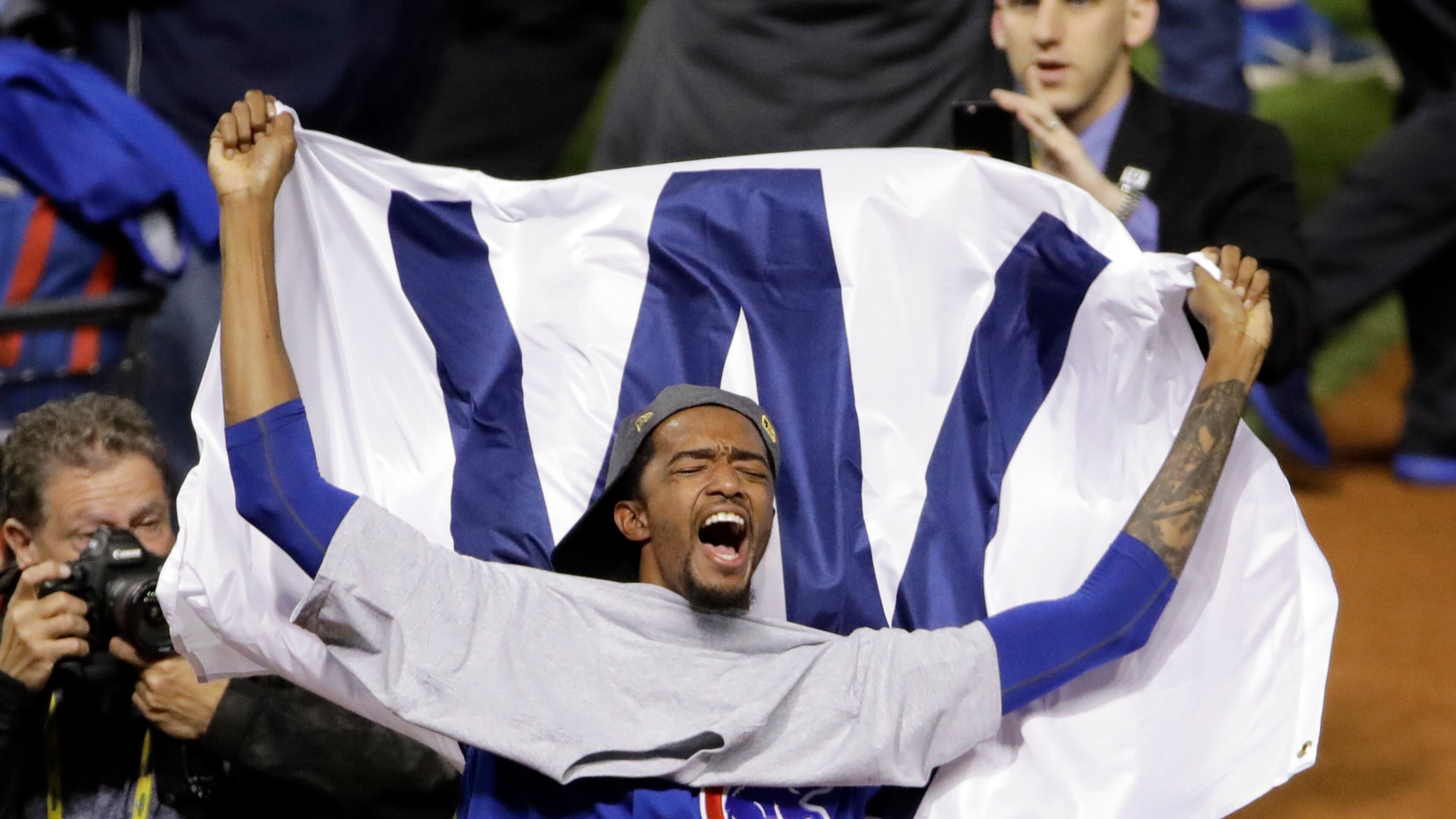 Chicago Cubs' Carl Edwards celebrates after Game 7 of the Major League Baseball World Series against the Cleveland Indians Thursday, Nov. 3, 2016, in Cleveland. The Cubs won 8-7 in 10 innings to win the series 4-3. (AP Photo/Gene J. Puskar)