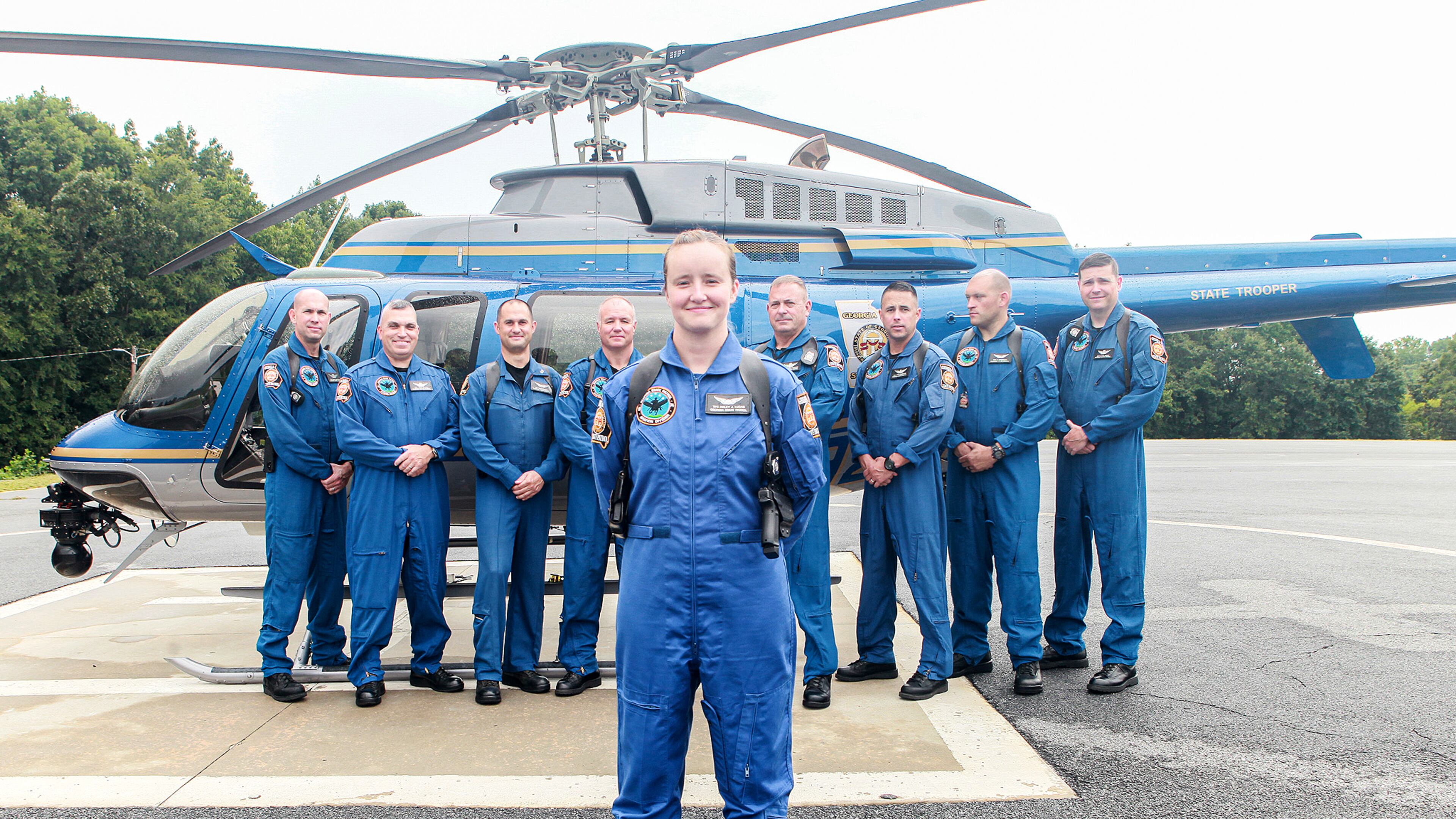 Trooper Haley Jo Lucas (front) is the first female pilot for the Georgia State Patrol.