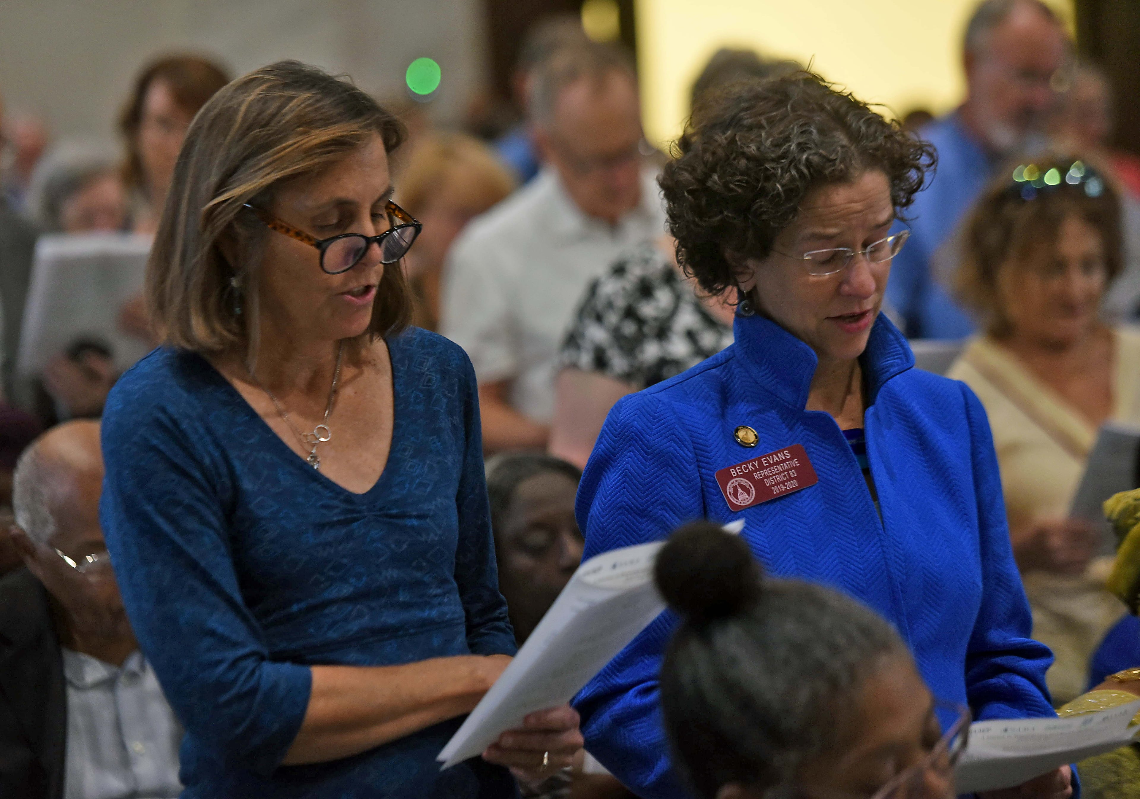 September 18, 2019 Atlanta - Georgia State Representative Becky Evans (right), District 83, reads along with members an apology adapted from âPrayer of Apology to African Americansâ by Marianne Williamson. RYON HORNE/RHORNE@AJC.COM