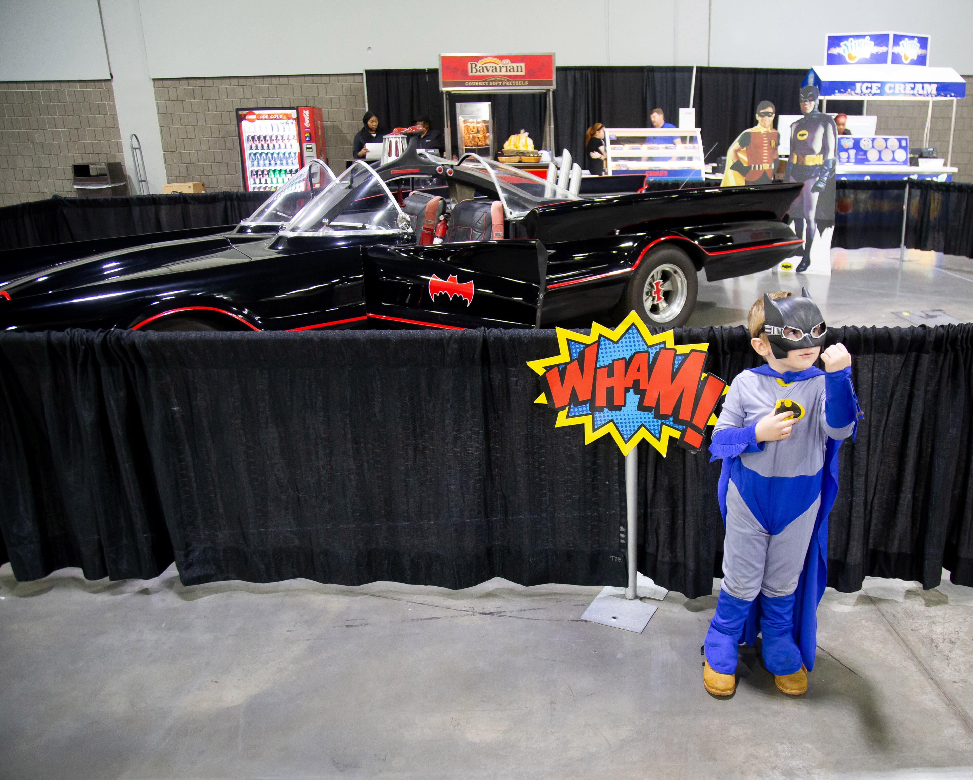 Landon Anglin, 5, poses for a photograph in front of a batmobile during the Atlanta Comic Con at the Georgia World Congress Center on Sunday, July 14, 2019. STEVE SCHAEFER / SPECIAL TO THE AJC