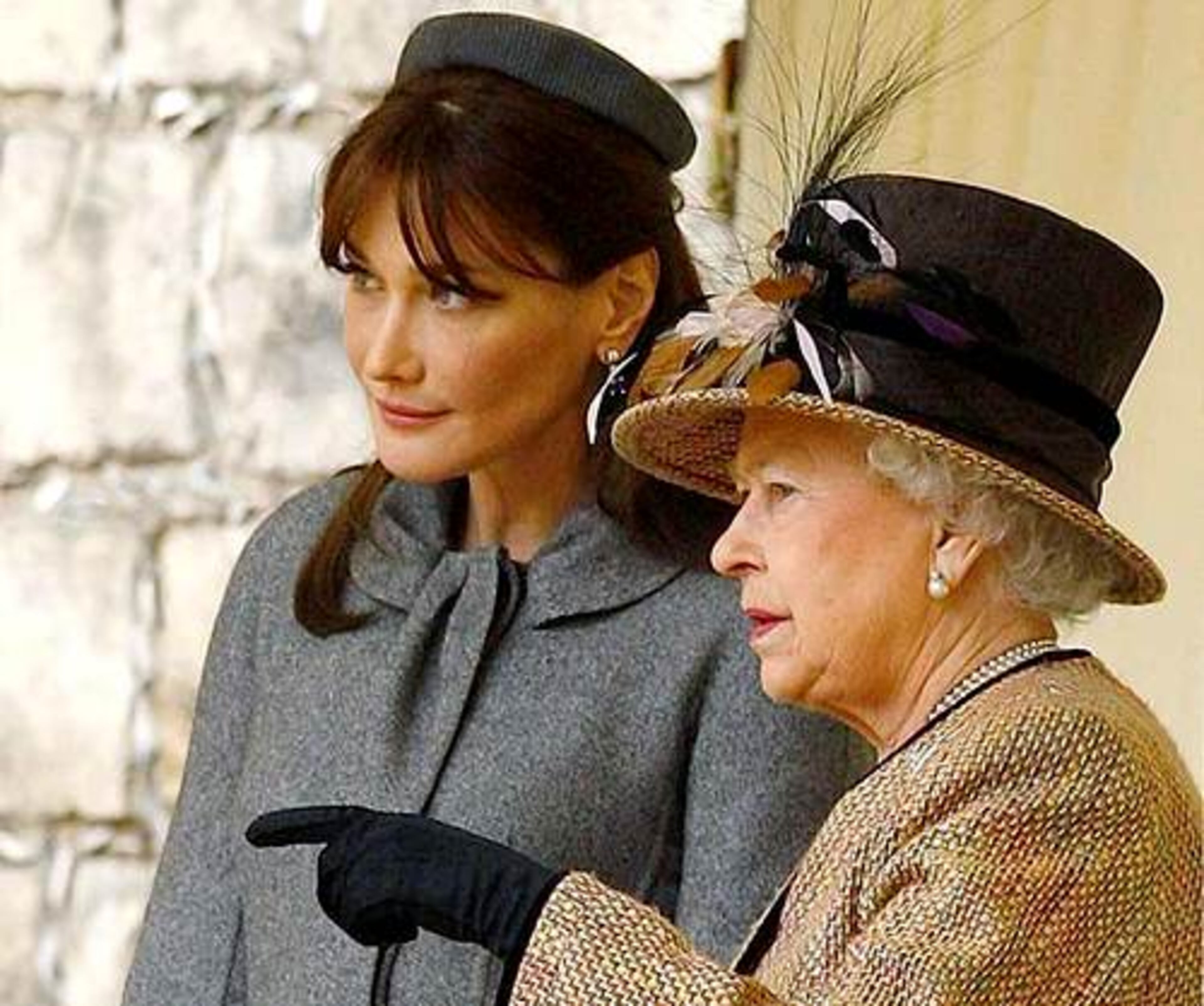 Britain's Queen Elizabeth II talks with Bruni-Sarkozy during welcoming ceremonies at Windsor Castle in Windsor, England, on Wednesday.