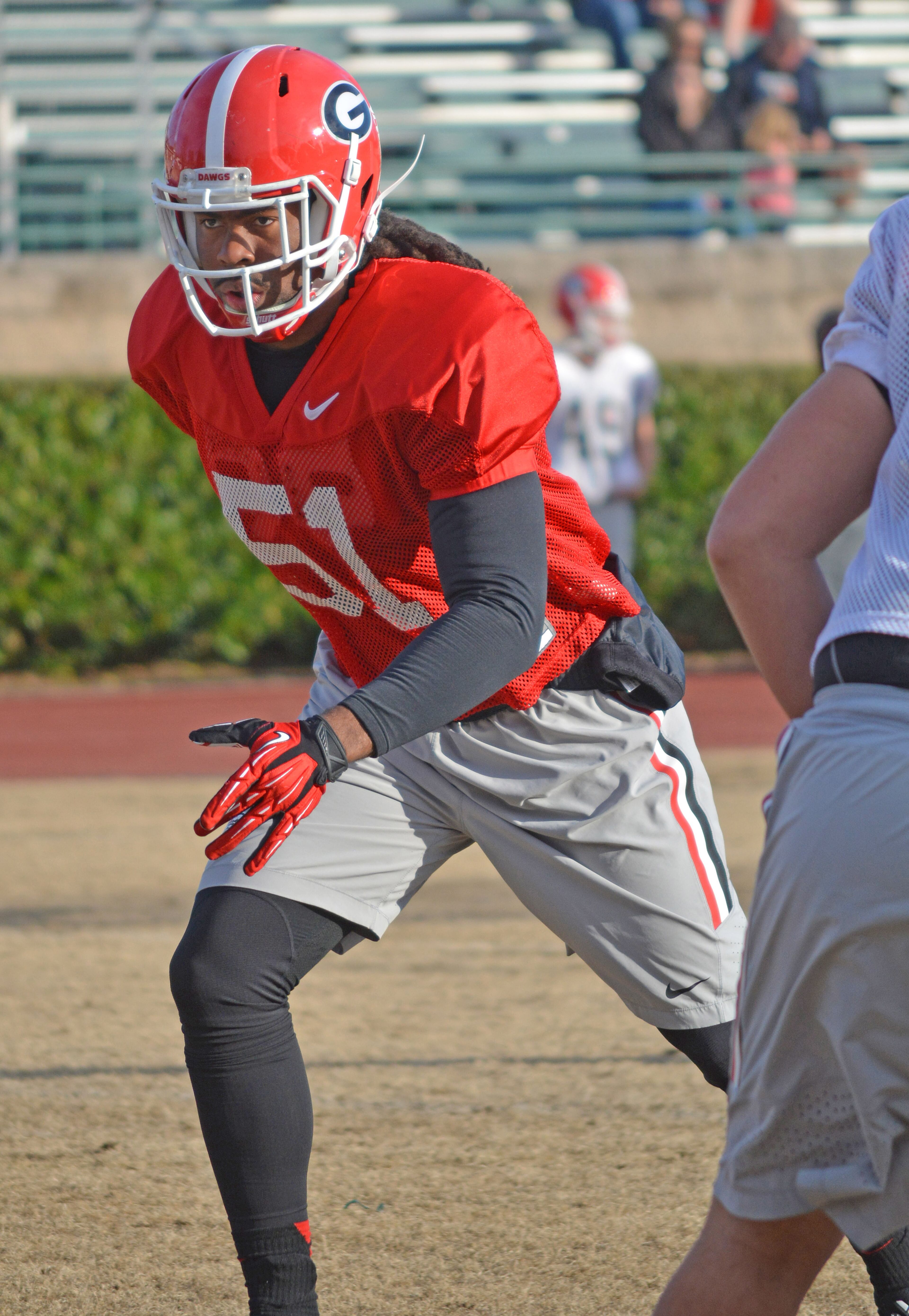 Linebacker Ramik Wilson runs a drill during a Belk Bowl practice at Charlotte Country Day School in Charlotte, N.C., on Saturday, Dec. 27, 2014. (Photo by Steven Colquitt / UGA Sports)