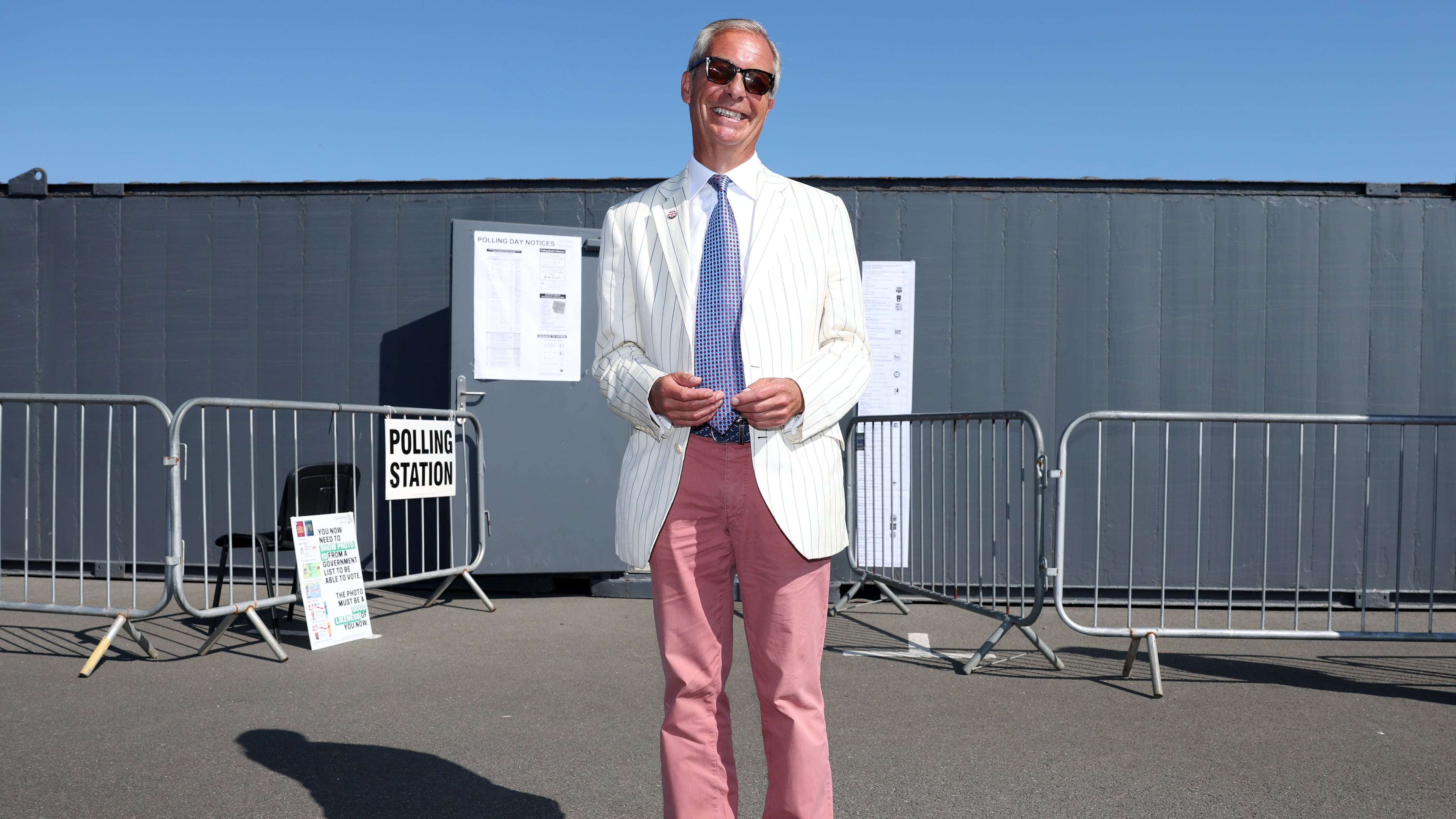 Britain's Reform UK party leader Nigel Farage arrives at a polling station in Walton on the Naze, Thursday, Aug. 13, 2026 to cast his vote for the Clacton on Sea by-election.(AP Photo/Richard Pelham)