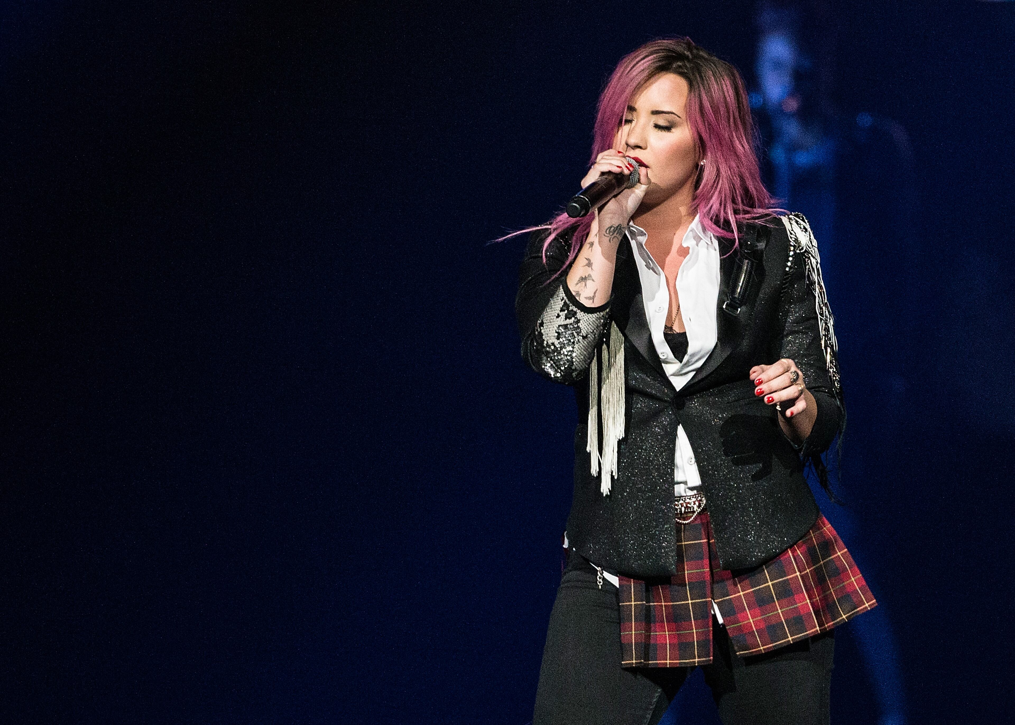 VANCOUVER, BC - FEBRUARY 09: Demi Lovato performs 'The Neon Lights Tour' opener at Rogers Arena on February 9, 2014 in Vancouver, Canada. (Photo by Andrew Chin/Getty Images)