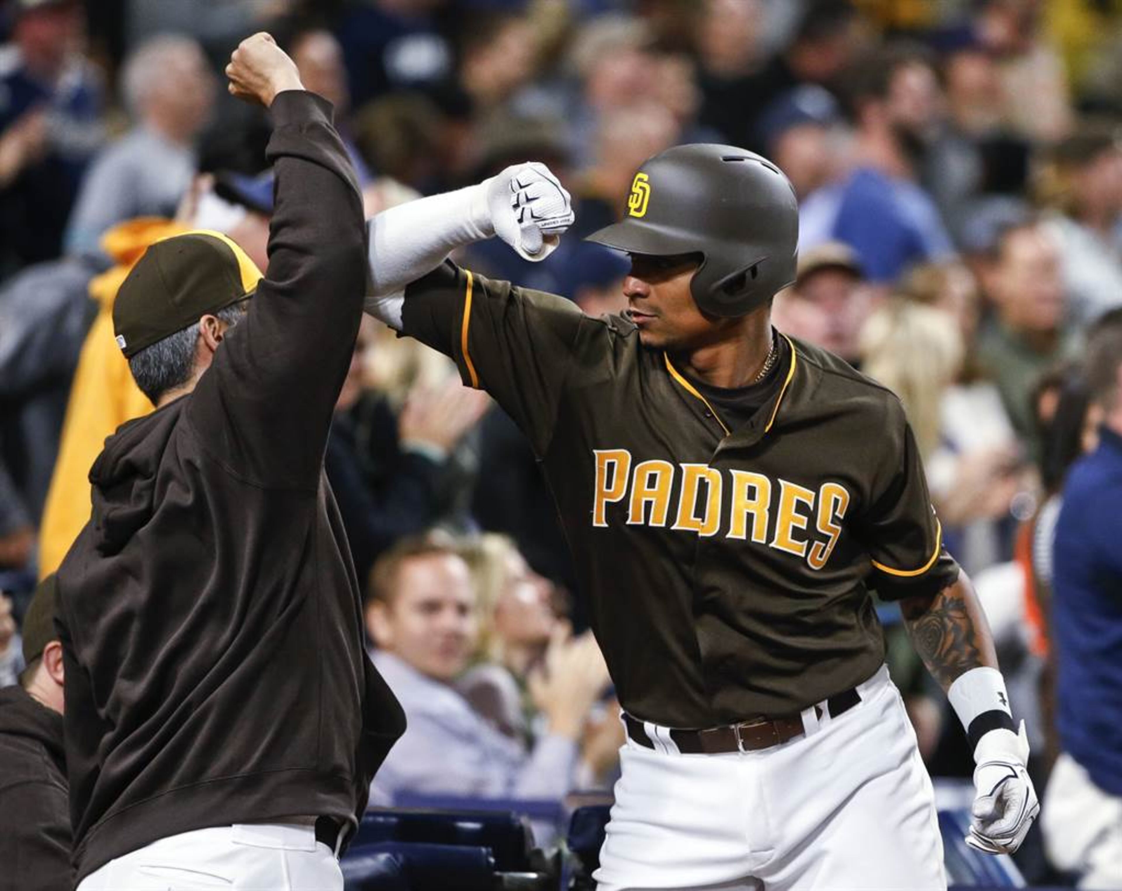 Melvin Upton celebrates after his ninth-inning homer lifted the Padres past the Dodgers in a game last month. (AP photo)