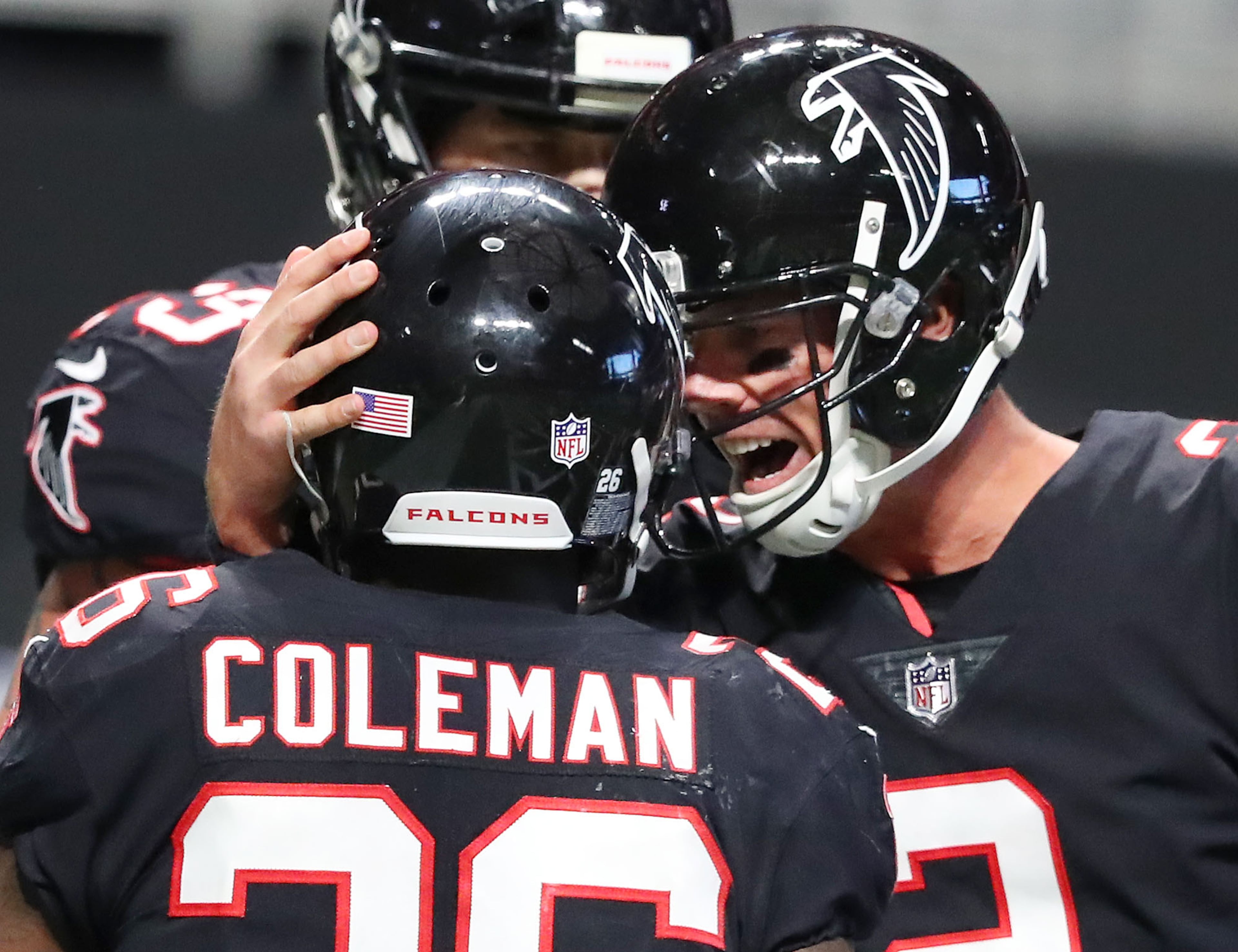 November 26, 2017 Atlanta: Falcons quarterback Matt Ryan celebrates with running back Tevin Coleman after his second touchdown run during the second half for a 34-20 lead over the Buccaneers during the fourth quarter in a NFL football game on Sunday, November 26, 2017, in Atlanta. Curtis Compton/ccompton@ajc.com