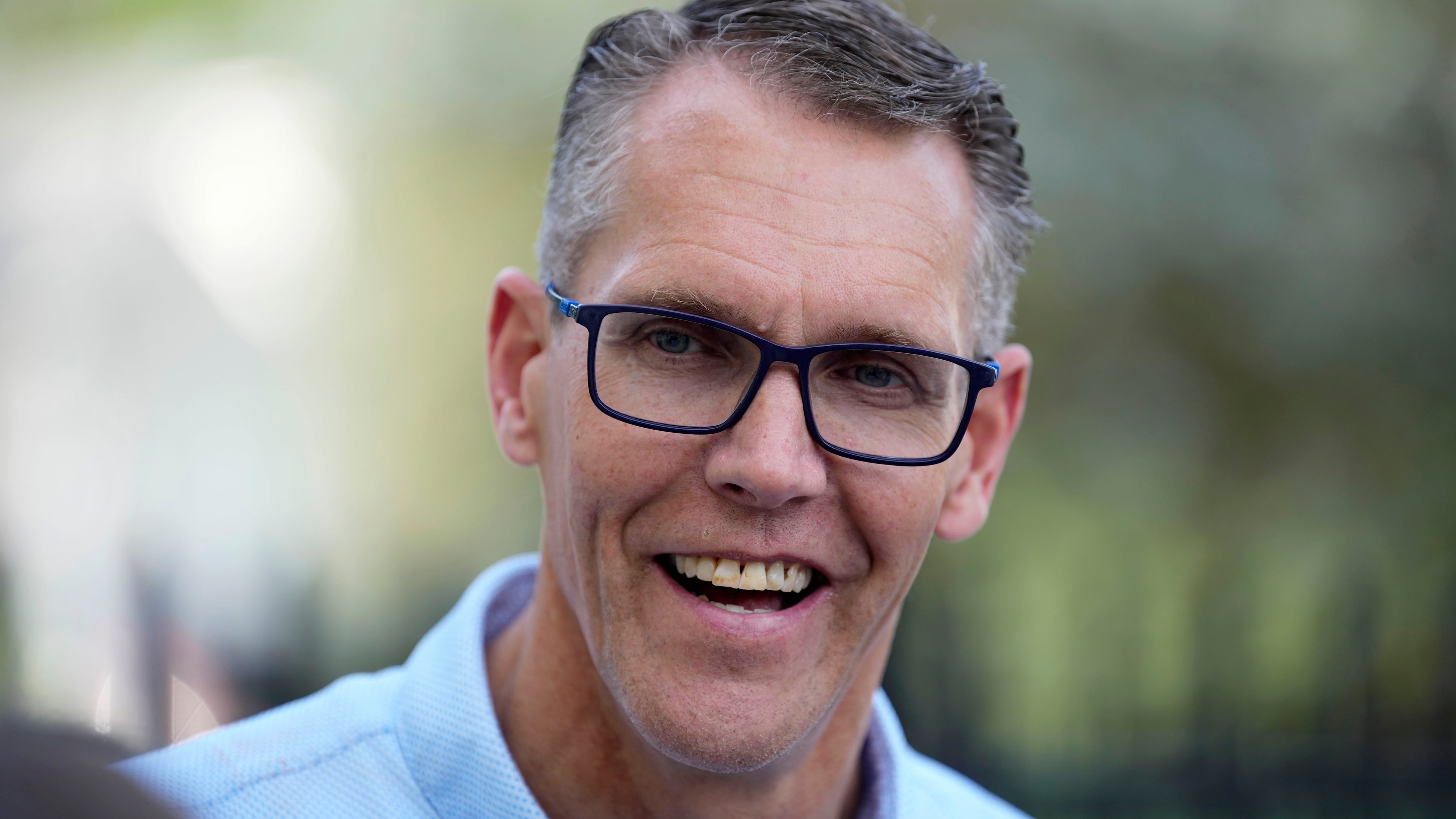 Rep. Randy Feenstra, R-Iowa, campaigns for the Republican nomination for governor during a rally with local residents, Wednesday, May 27, 2026, in West Des Moines, Iowa. (AP Photo/Charlie Neibergall)