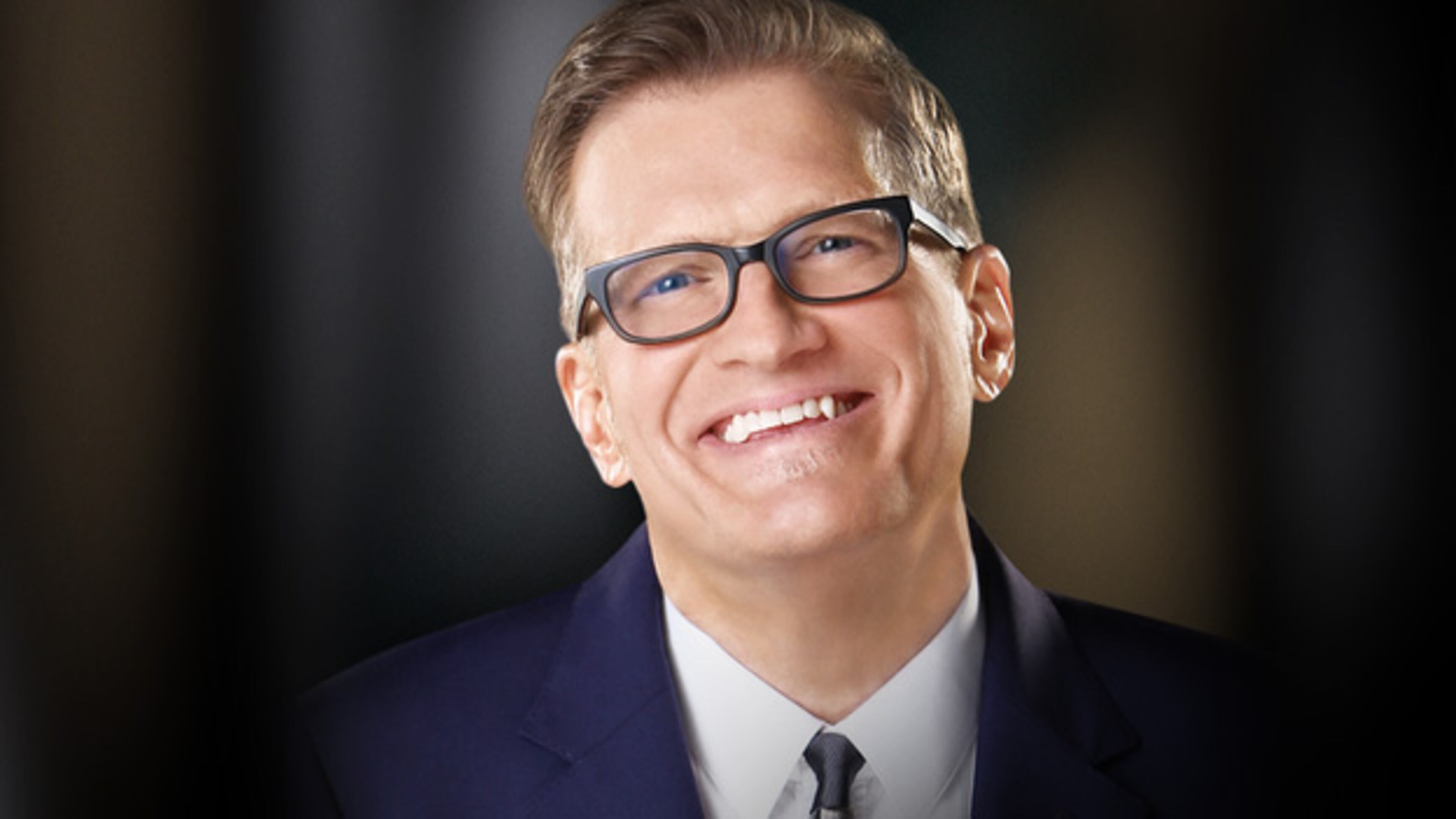 The stand-up comedian and actor, known for long-running shows, "The Drew Carey Show" and "Whose Line Is It Anyway?" went on to host "The Price Is Right," and brings his humor to the ballroom this season.
