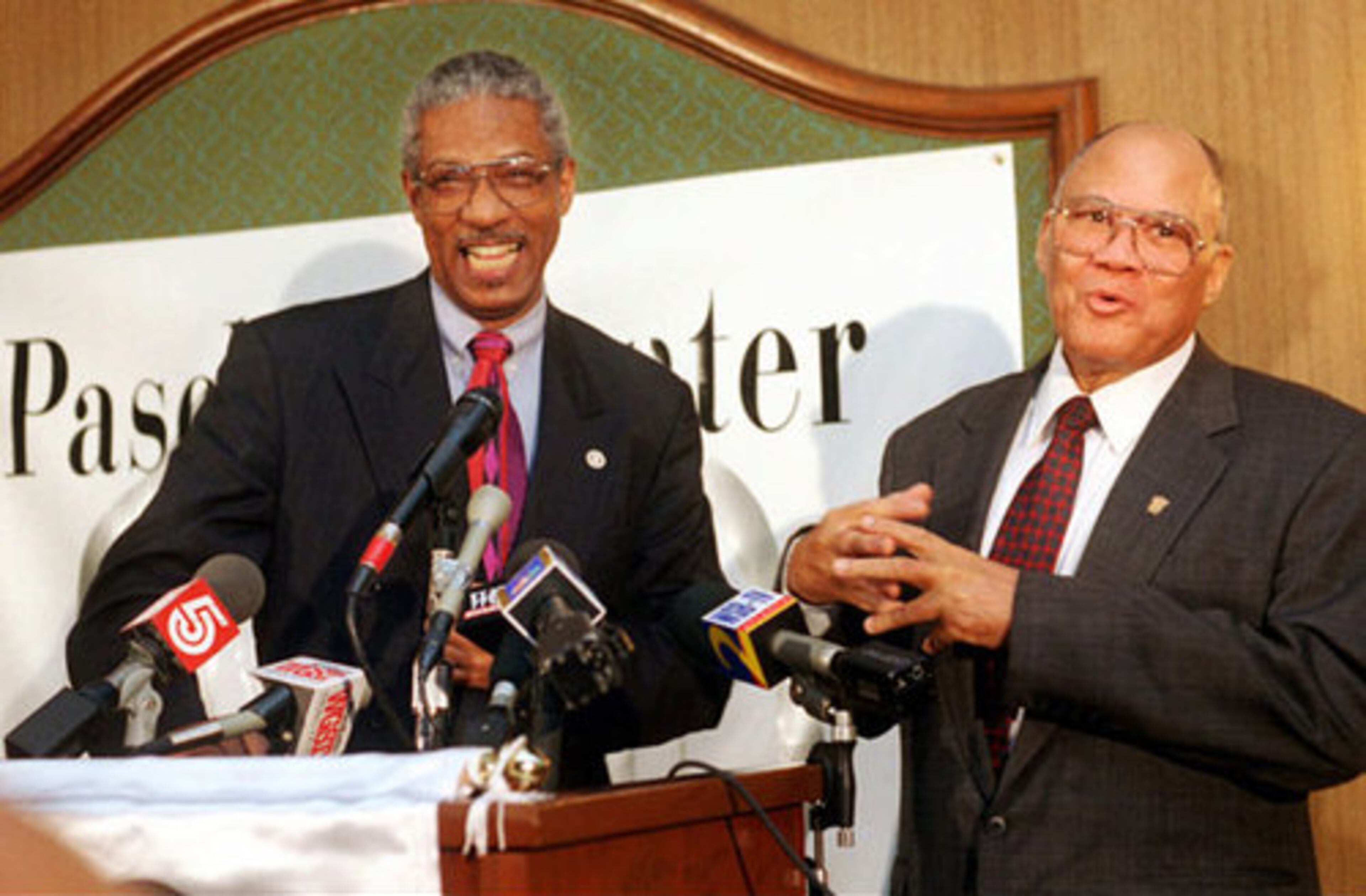 Thomas Cole (left), President of Clark Atlanta University and James Paschal share a laugh at the press conference announcing CAU acquisition of Paschal's. The school still operates the restaurant and uses the motor lodge as a dormitory.