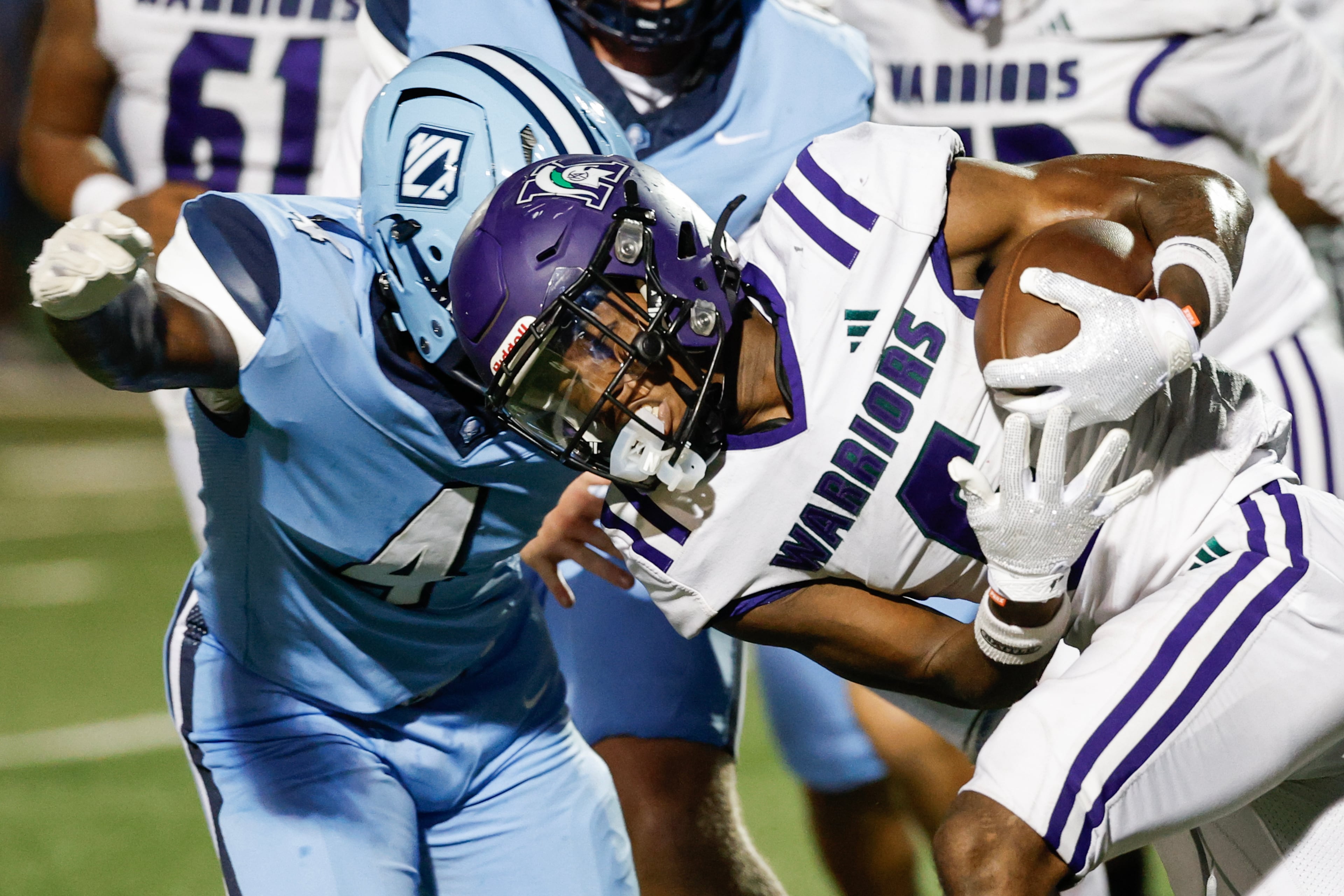 KIPP Atlanta’s Malachi Heard (right) rushes against North Cobb Christian's Haiden Gibson during their game on Friday, Oct. 2, 2026, in Kennesaw. (Erik S. Lesser for the AJC)