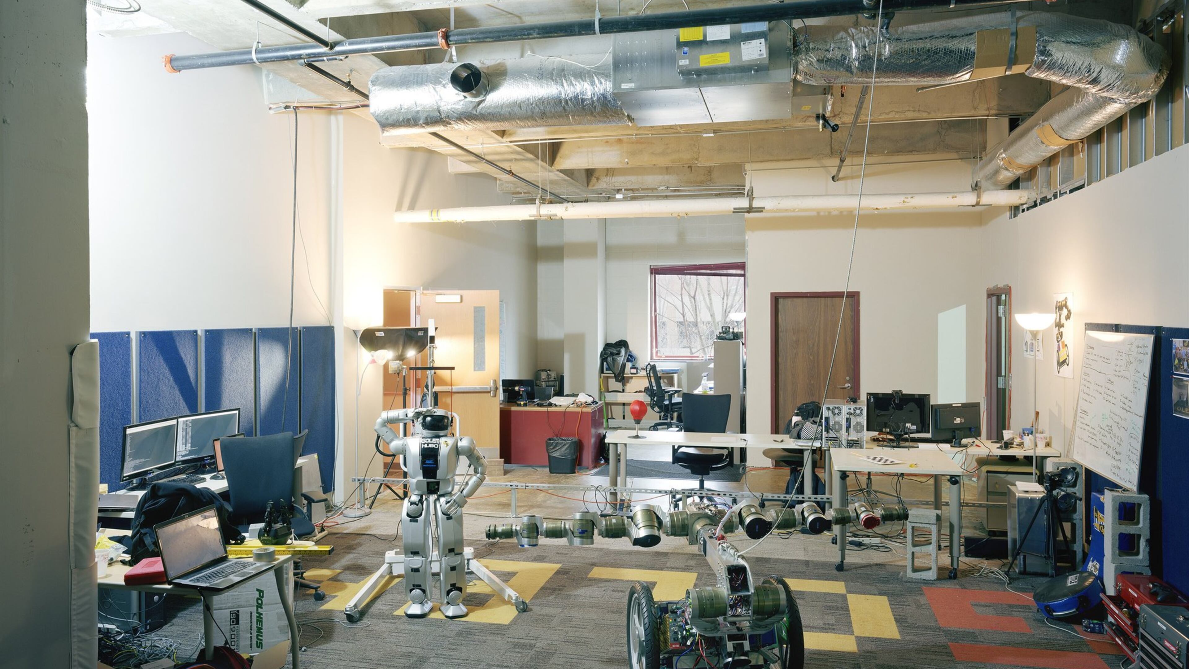Thomas Struth’s “Golem’s Playground” shows the interior of a robotics laboratory at Georgia Tech, one of two photographs he shot in Atlanta in 2013 that are part of a new exhibit at the High Museum. CONTRIBUTED BY THOMAS STRUTH
