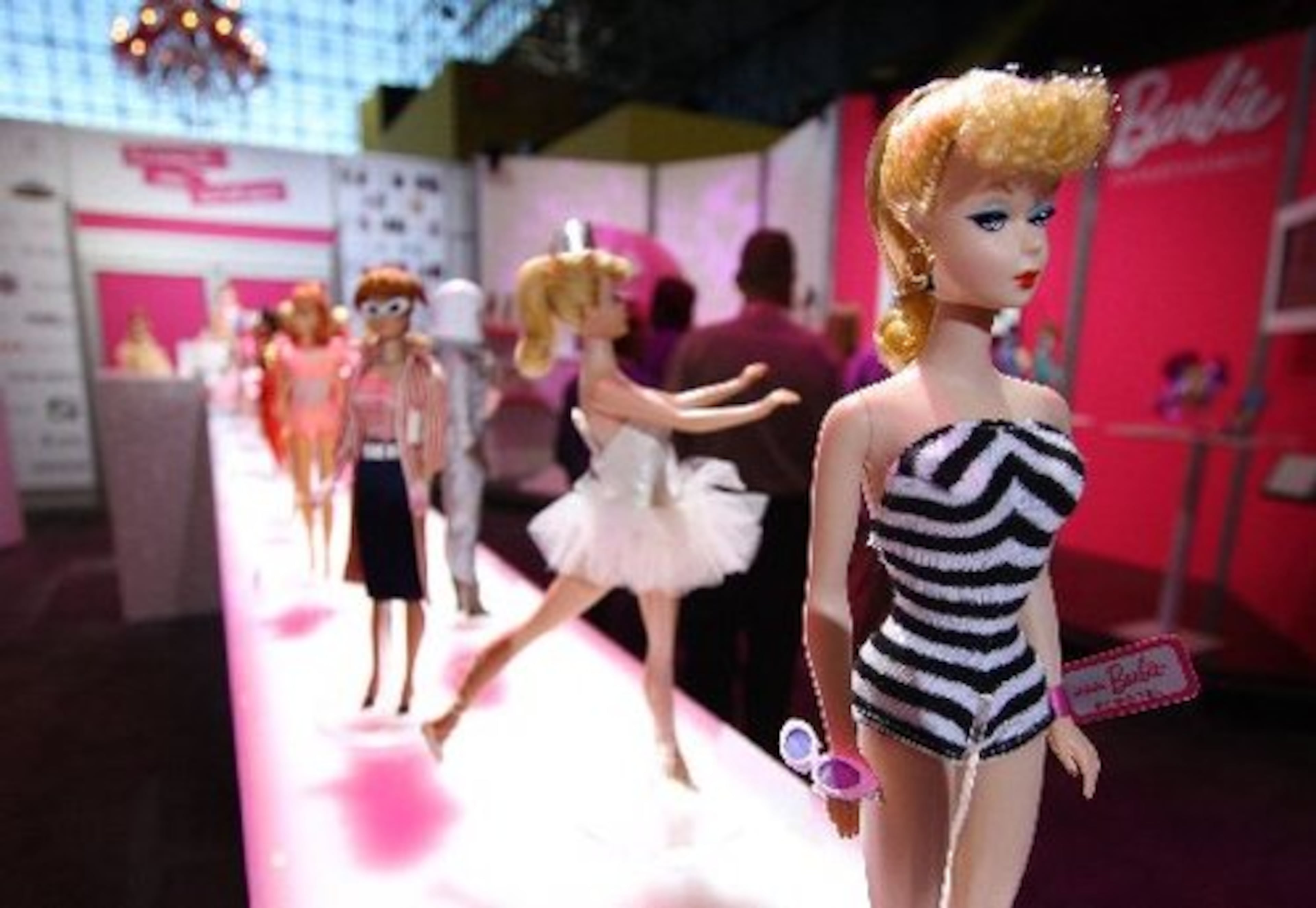Here you can see other Barbie dolls lined up behind the original doll.
