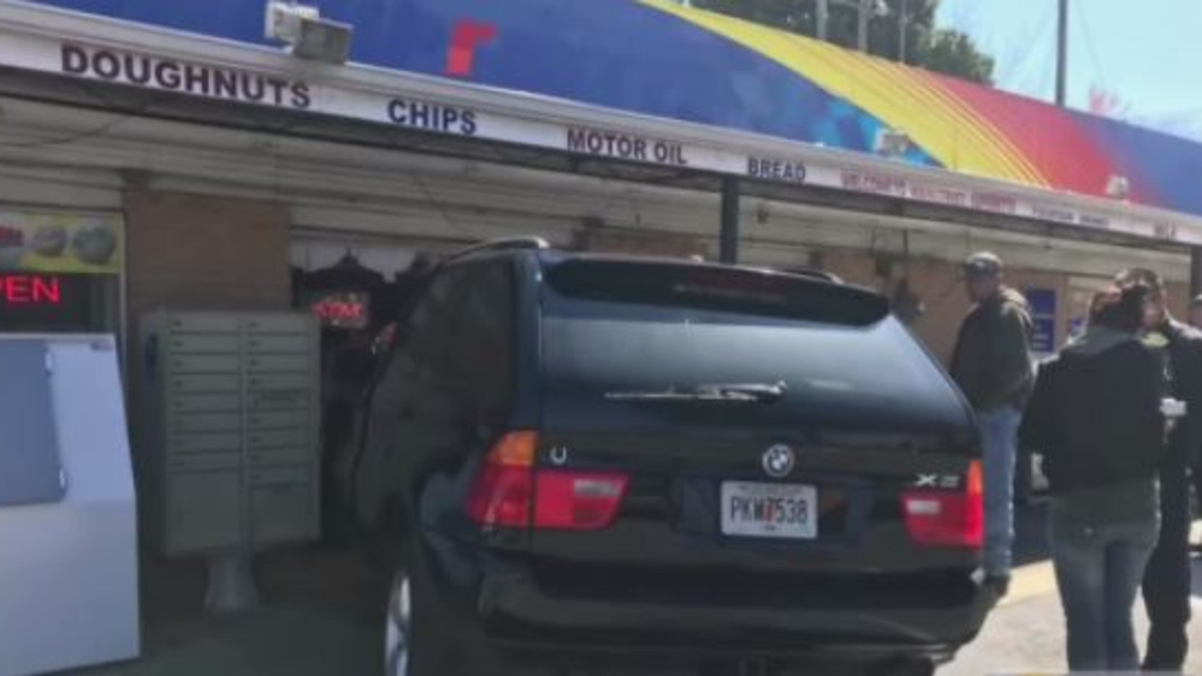 Junior Patel was behind the counter at Big Shanty Supertte on Thursday when a BMW X6 drove right into the building. (Credit: Channel 2 Action News)