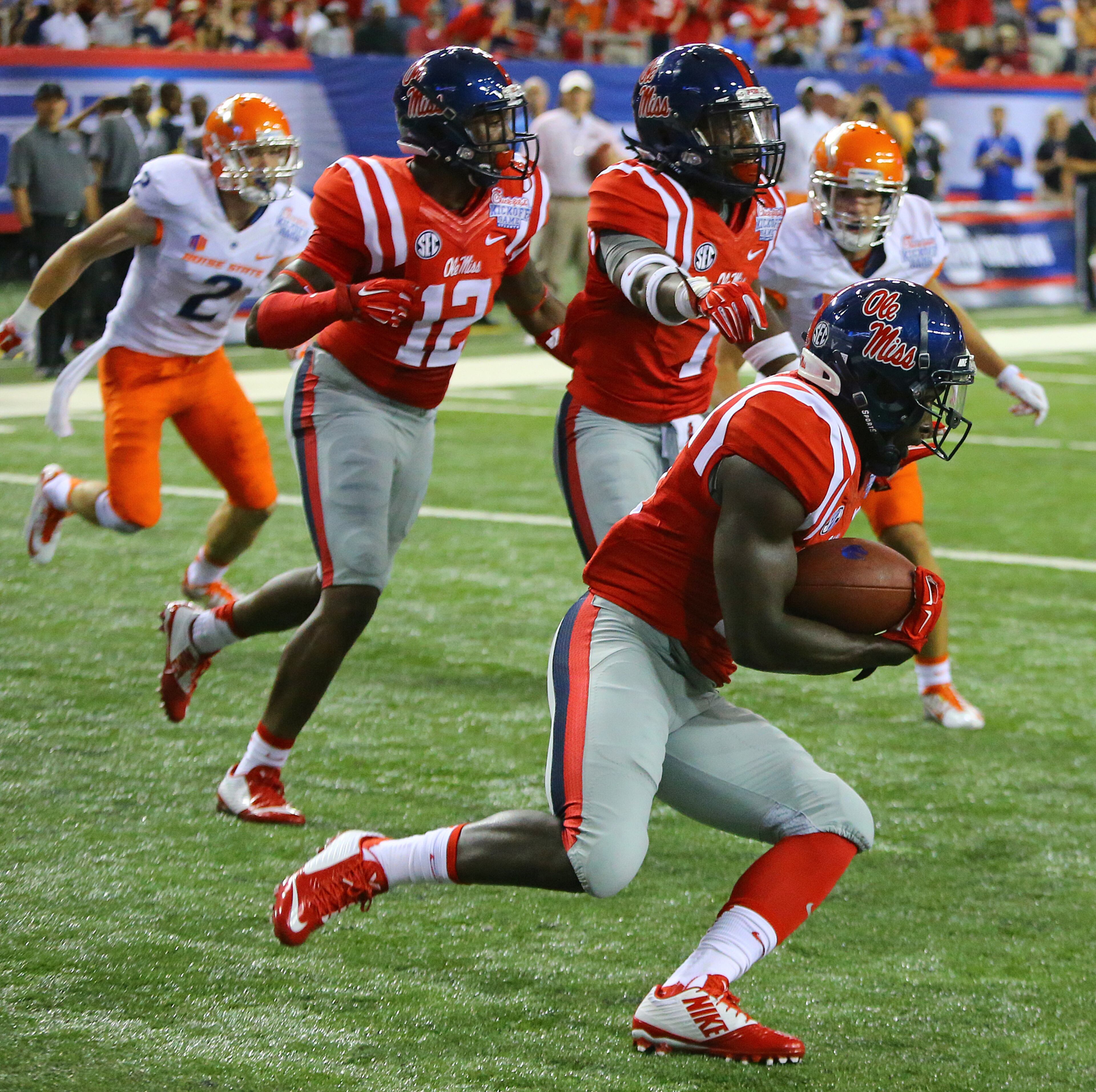 Ole Miss defensive back Senquez Golson intercepts Boise State in the endzone during the first quarter of their NCAA college football game in Atlanta on Thursday, August 28, 2014. CURTIS COMPTON / CCOMPTON@AJC.COM