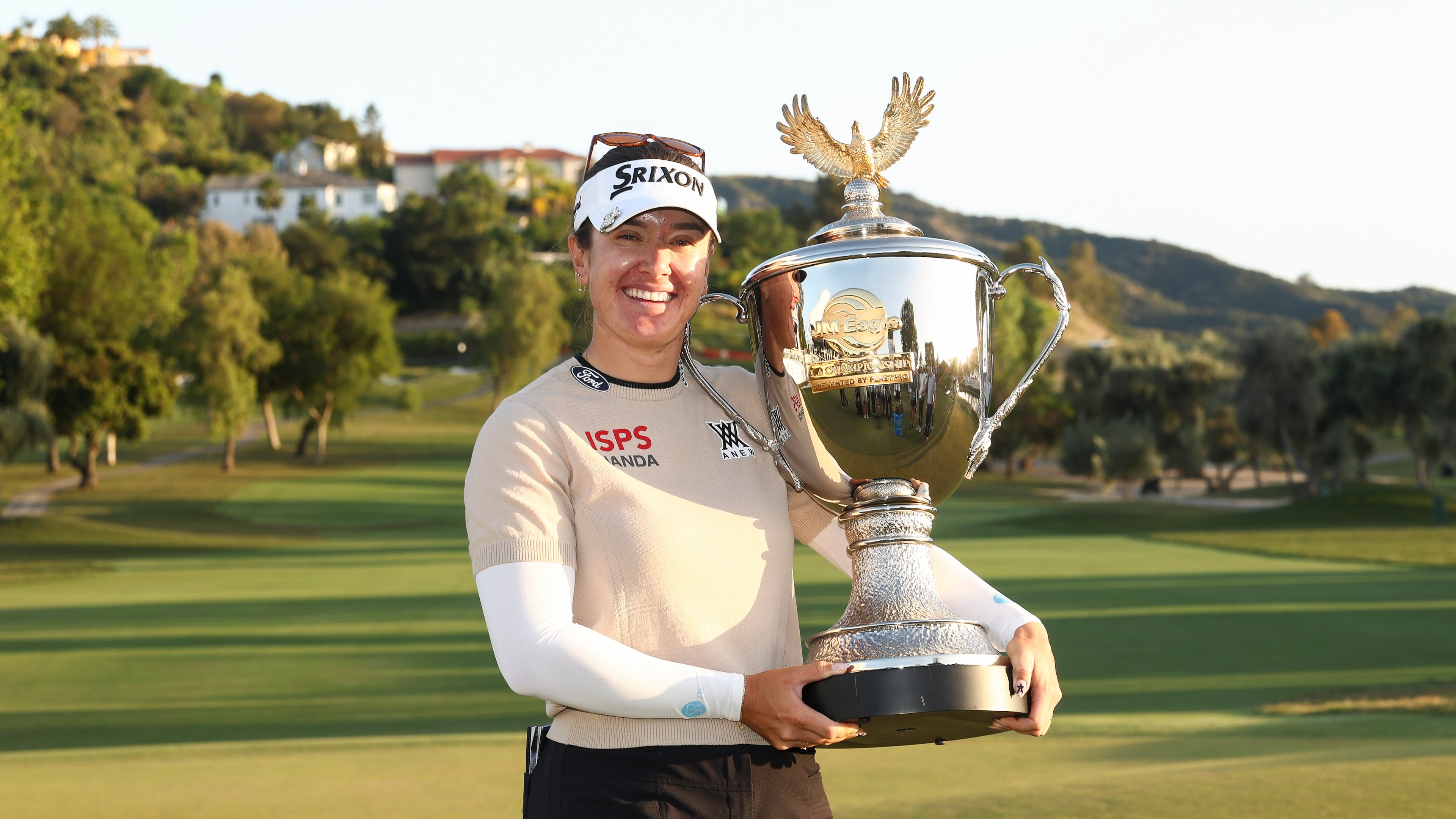 Hannah Green poses with the trophy after winning the LPGA JM Eagle LA Championship golf tournament at El Caballero Country Club Sunday, April 19, 2026, in Los Angeles. (AP Photo/Jessie Alcheh)