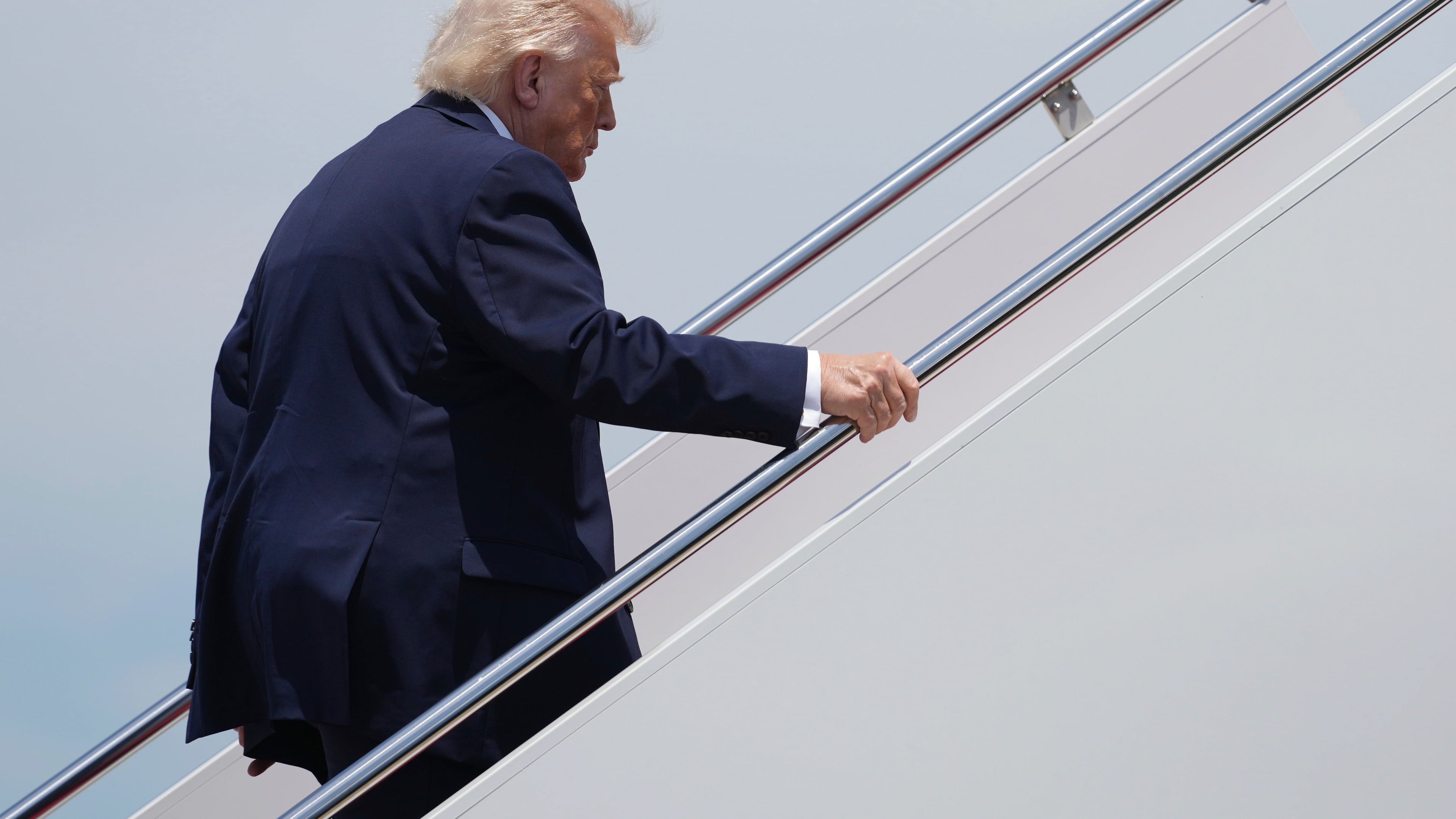 President Donald Trump boards Air Force One, Friday, June 5, 2026, at Joint Base Andrews, Md. (AP Photo/Mark Schiefelbein)