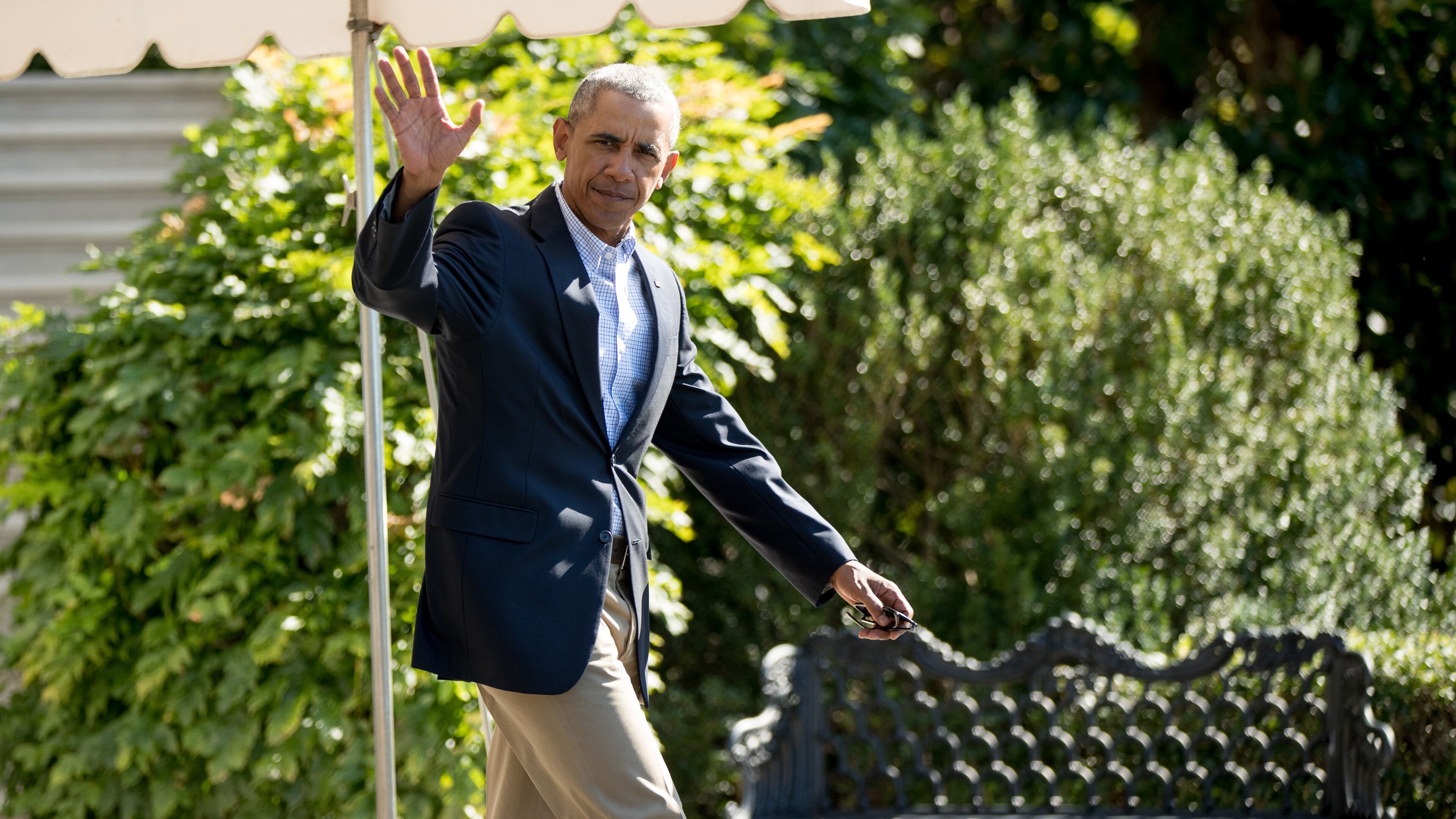 President Barack Obama waves as he walks to Marine One on the South Lawn of the White House in Washington, Tuesday, Aug. 23, 2016, for a short trip to Andrews Air Force Base, Md., then onto Baton Rouge, La., where he will get a first-hand look at the impact of recent devastating floods. (AP Photo/Andrew Harnik)