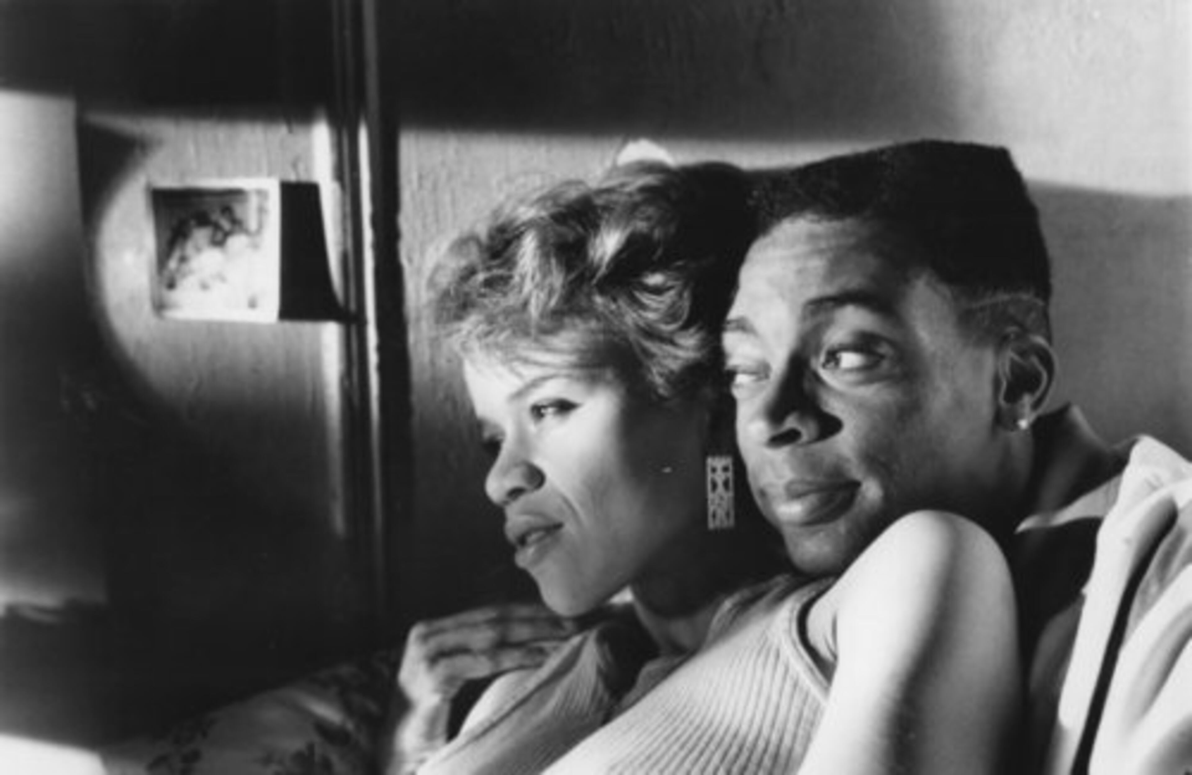 IN A scene from the movie, characters Tina and Mookie embrace. (Love the low fade, Spike!)