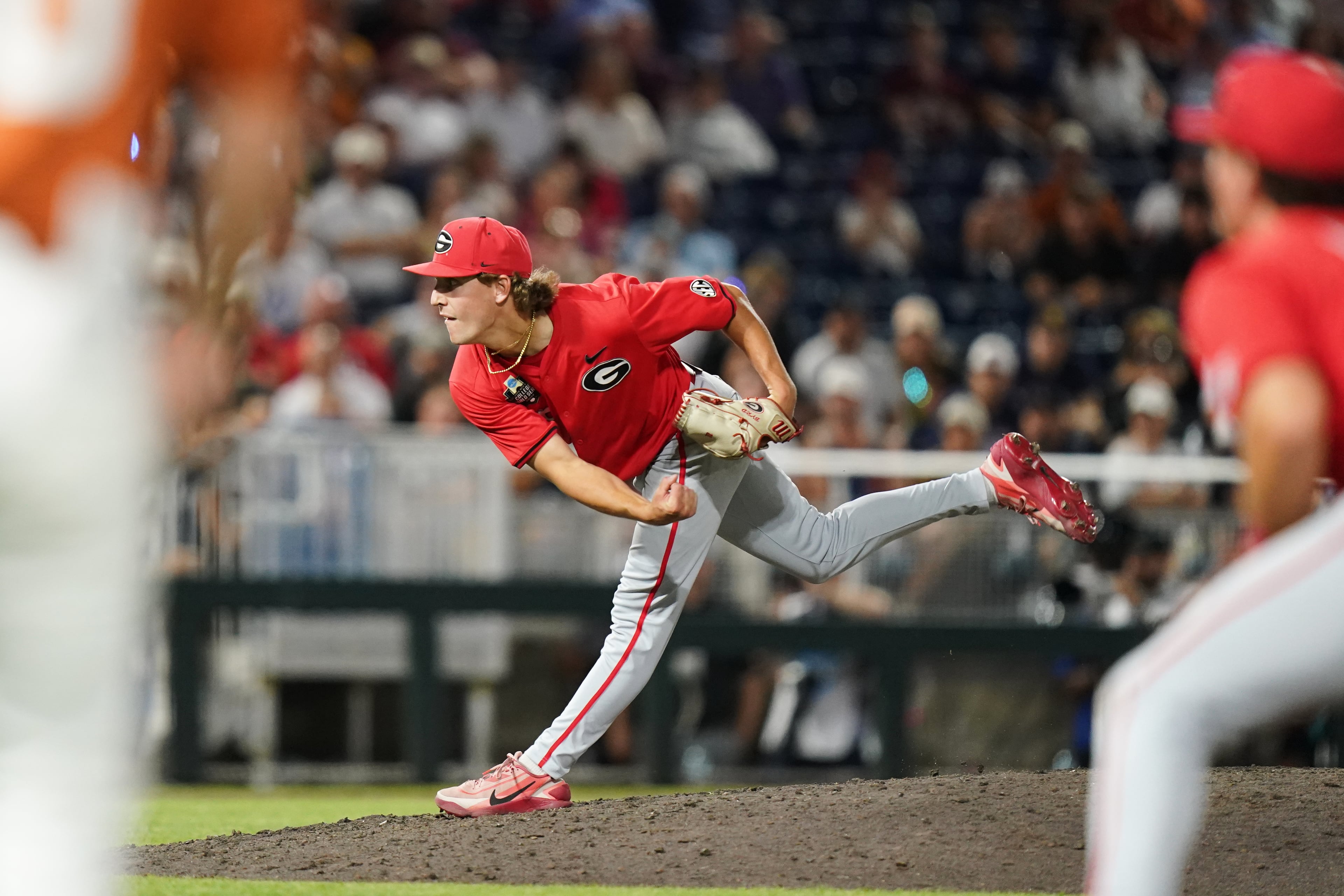 Georgia pitcher Justin Byrd (5) throws during an NCAA baseball College World Series elimination game against Texas, Tuesday, June 16, 2026 in Omaha, Neb. Georgia won 2-0. (AP Photo/Vera Nieuwenhuis)