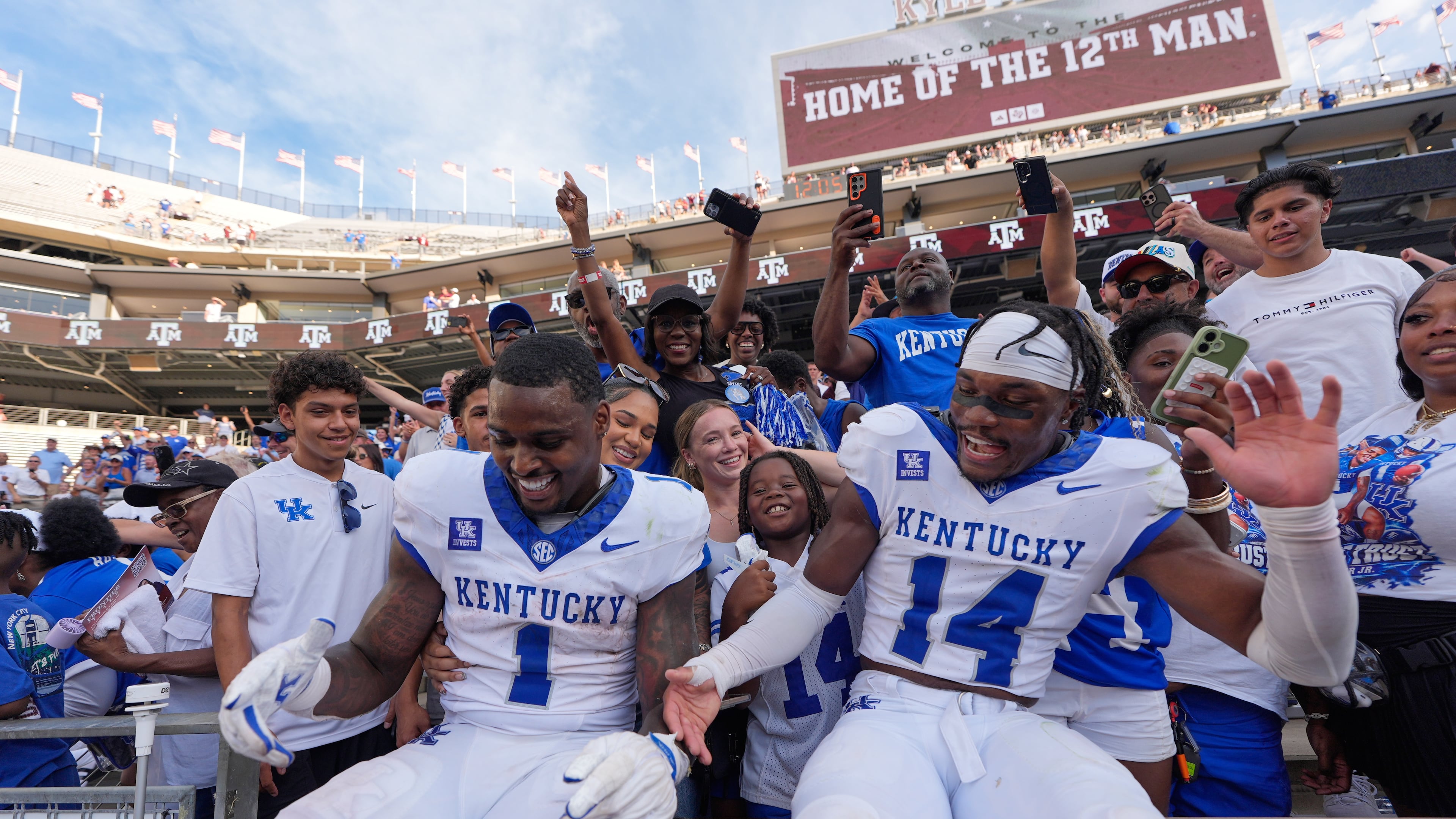 Kentucky's CJ Baxter Jr. (1) and Ty Bryant (14) celebrate after an NCAA college football game against Texas A&M Saturday, Sept. 19, 2026, in College Station, Texas. (AP Photo/David J. Phillip)
