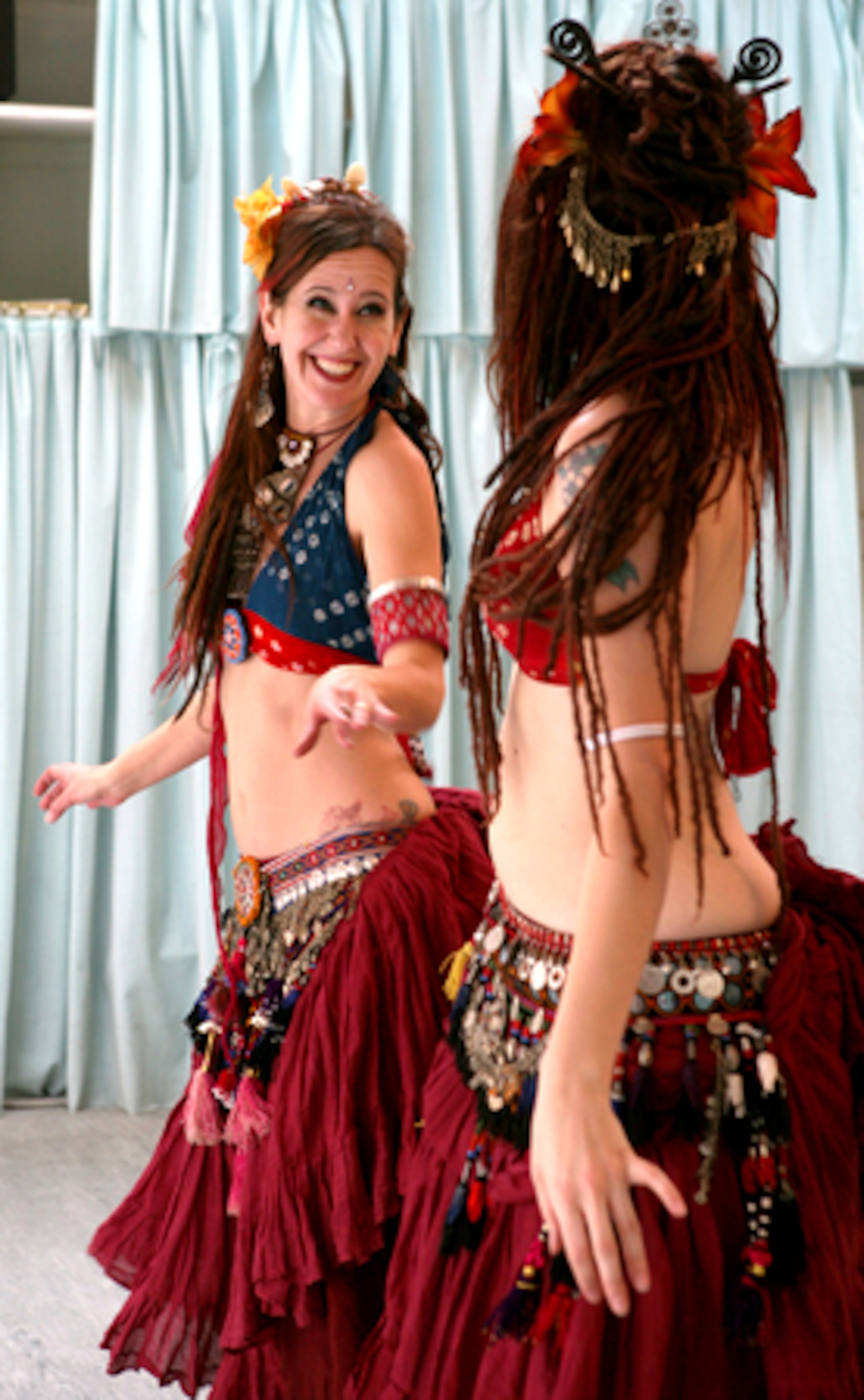 McKinney-Taylor and Brigham dance in a Virginia-Highlands studio. TribalCon attracts dancers from around the country.