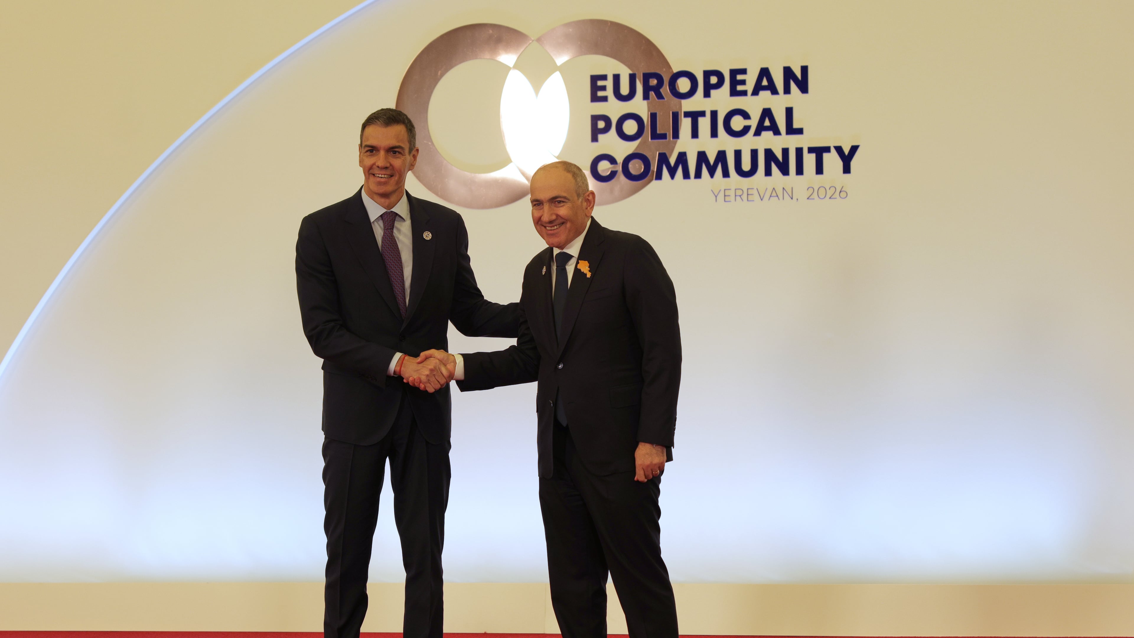 Spain's Prime Minister Pedro Sanchez, left, shakes hands with Armenia's Prime Minister Nikol Pashinyan as he arrives for a meeting of the European Political Community in Yerevan, Armenia, Monday, May 4, 2026. (AP Photo/Anthony Pizzoferrato)