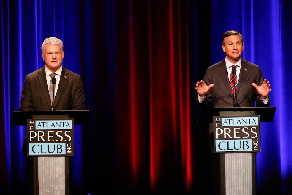 Republican U.S. Senate candidates Mike Collins, left, and Derek Dooley participate in the Atlanta Press Club Loudermilk-Young Debate Series on Sunday. (Arvin Temkar/AJC)