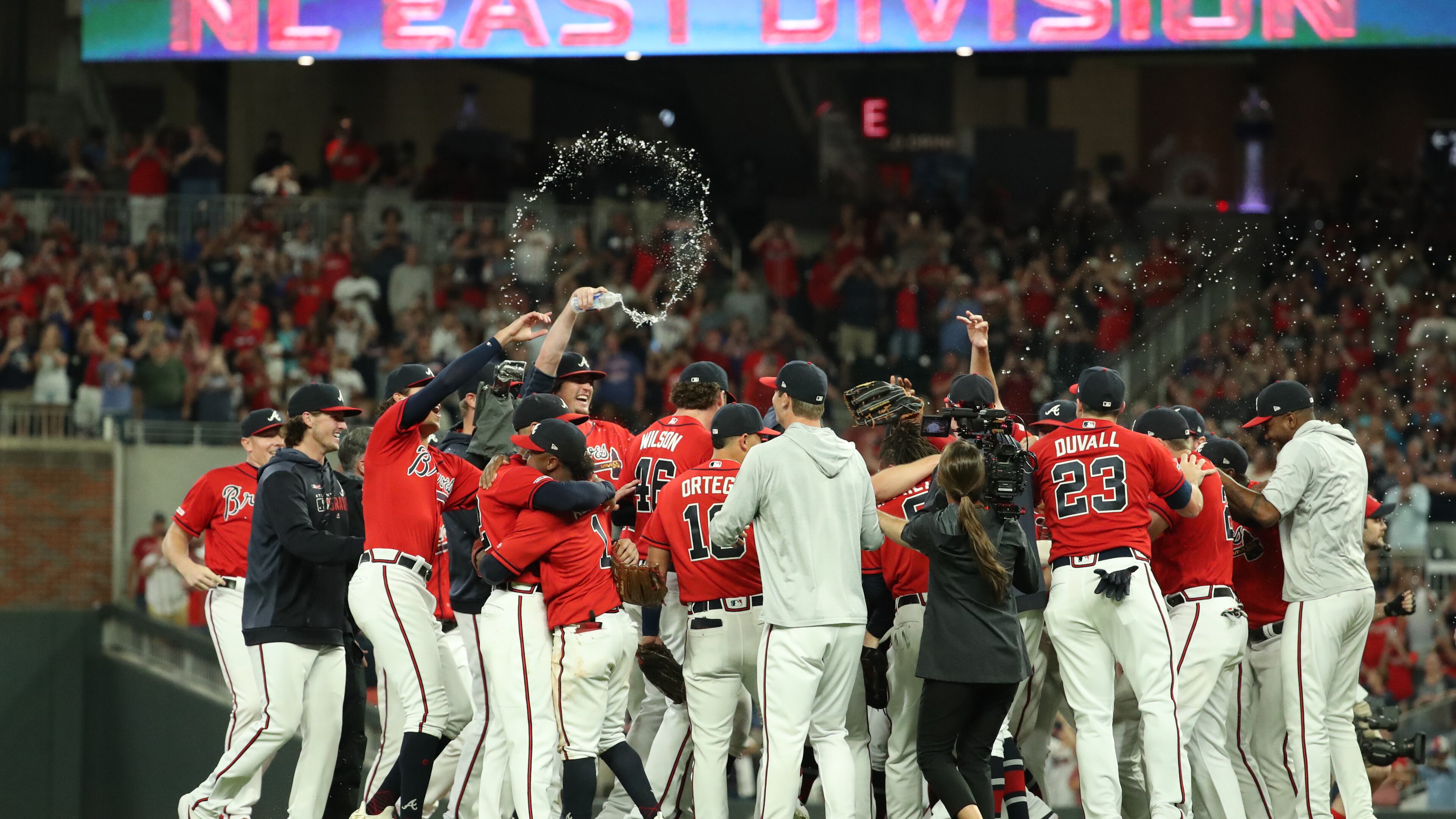 Atlanta Braves players celebrate their 6-0 win against the San Francisco Giants to clinch the NL East division at Sun Trust Park Friday, September 20, 2019 in Atlanta. (JASON GETZ/SPECIAL TO THE AJC)