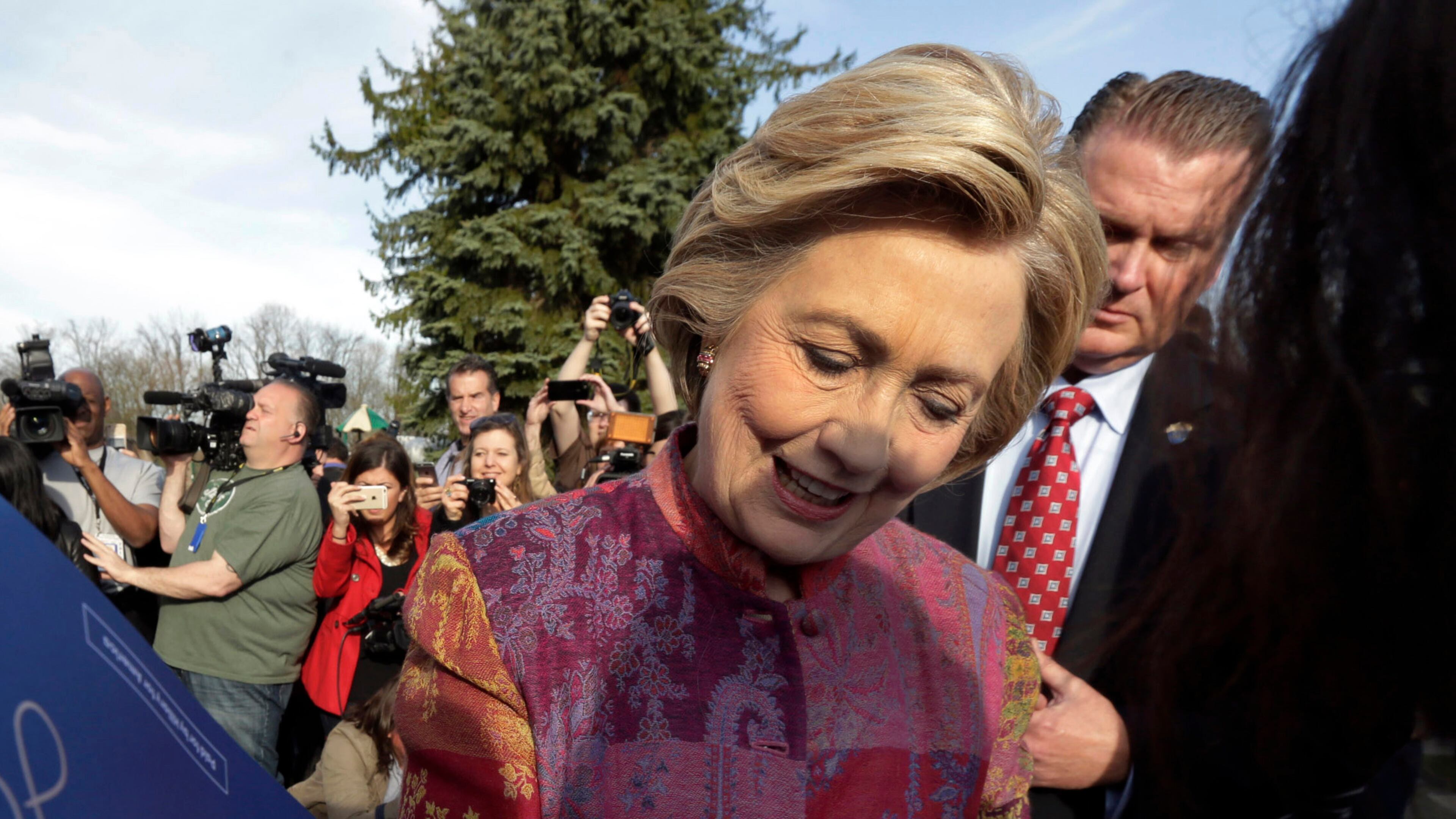 Democratic presidential candidate Hillary Clinton signs autographs after voting at the Grafflin Elementary School in Chappaqua, N.Y., Tuesday, April 19, 2016. (AP Photo/Richard Drew)