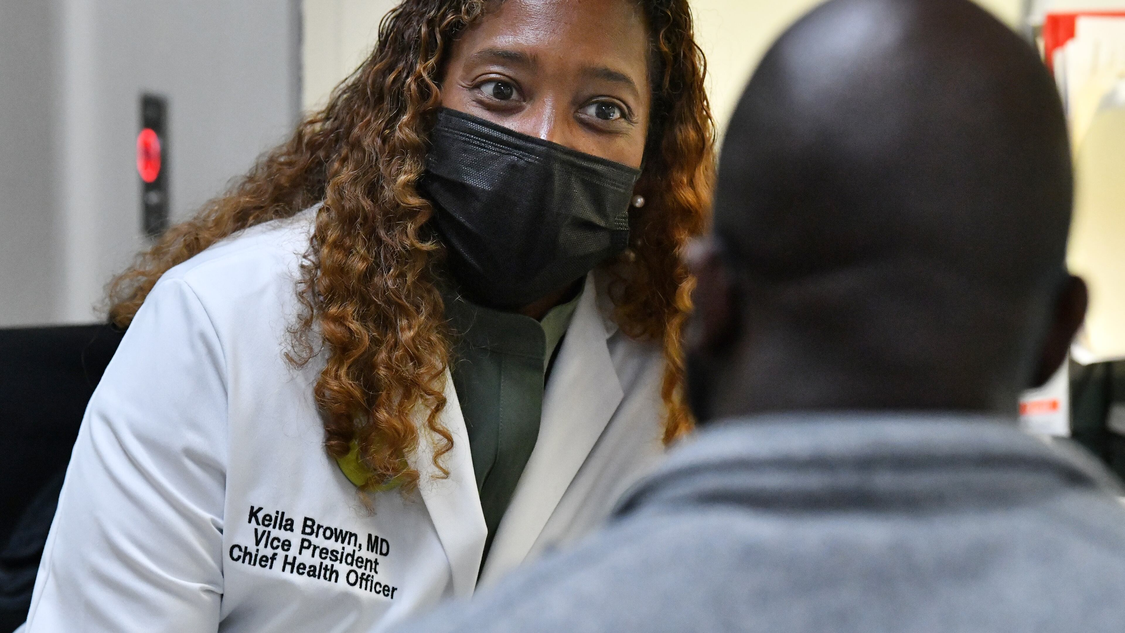 Dr. Keila Brown (left), vice president and chief health officer, confers with Dr. Dale Kesley Robertson at the Family Health Center at West End, Thursday, May 11, 2023, in Atlanta. The loss of hospital services at Atlanta Medical Center’s two locations in downtown and East Point is the subject of plans and discussion for both Atlanta and Fulton County elected officials. While leaders say they want new clinics and health facilities, existing clinics say they already reach out to the same people, offering care to the poor and uninsured.(Hyosub Shin / Hyosub.Shin@ajc.com)
