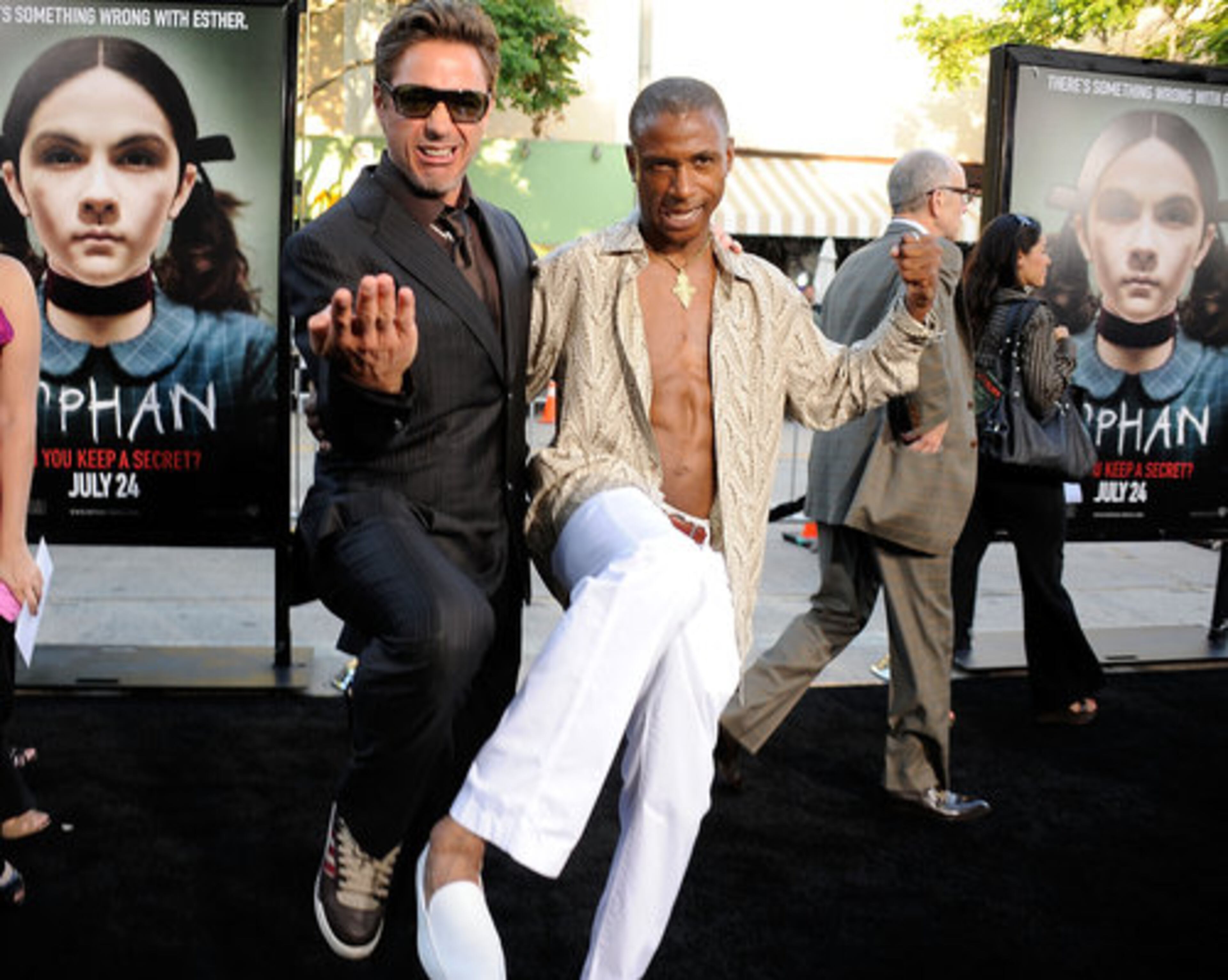 Robert Downey Jr. and actor/comedian Tommy Davidson ('In Living Color') ham it up on the red carpet.