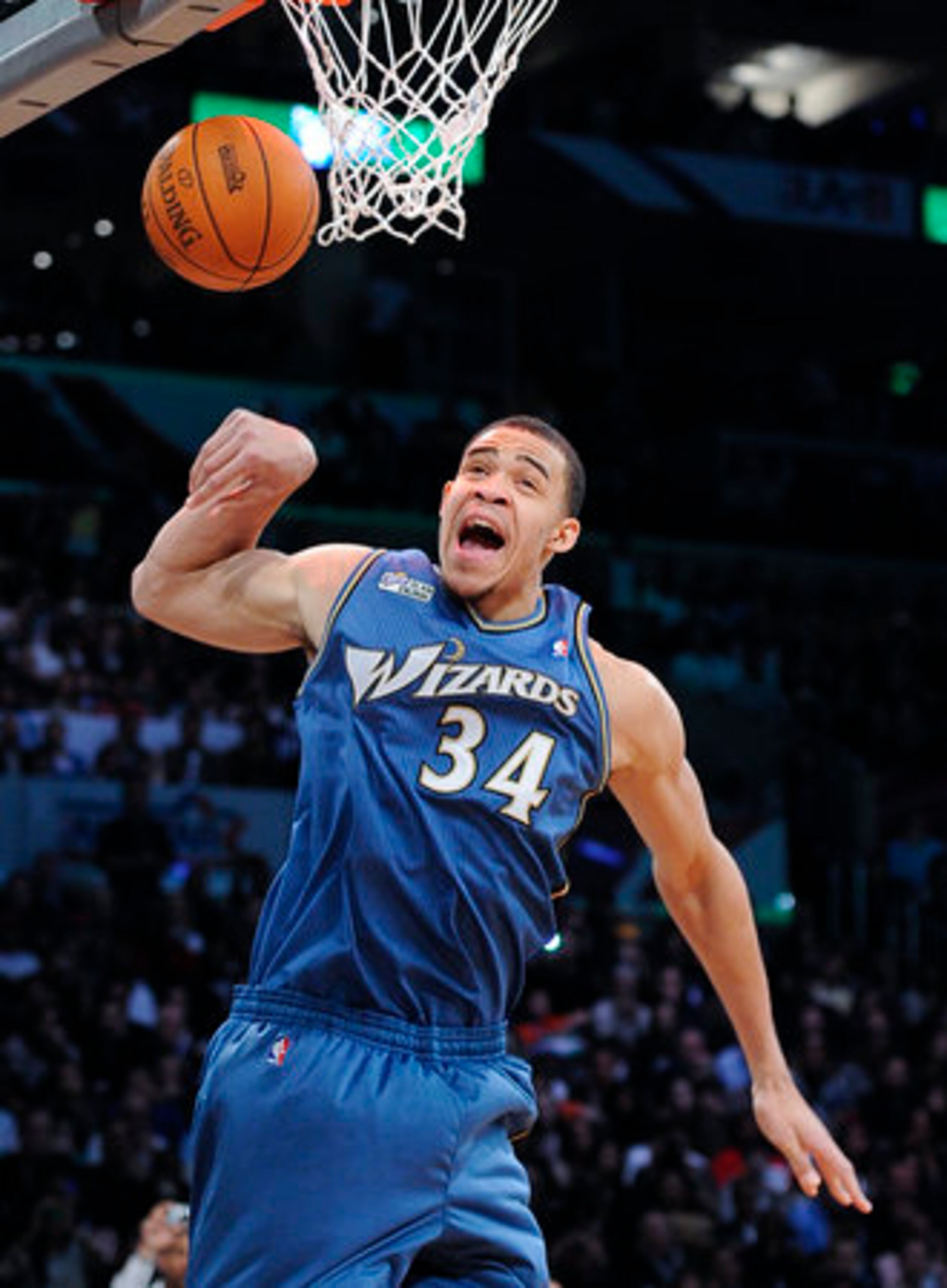Washington Wizards' JaVale McGee reacts during the Slam Dunk Contest at the NBA basketball All-Star Saturday Night, Saturday, Feb. 19, 2011, in Los Angeles.