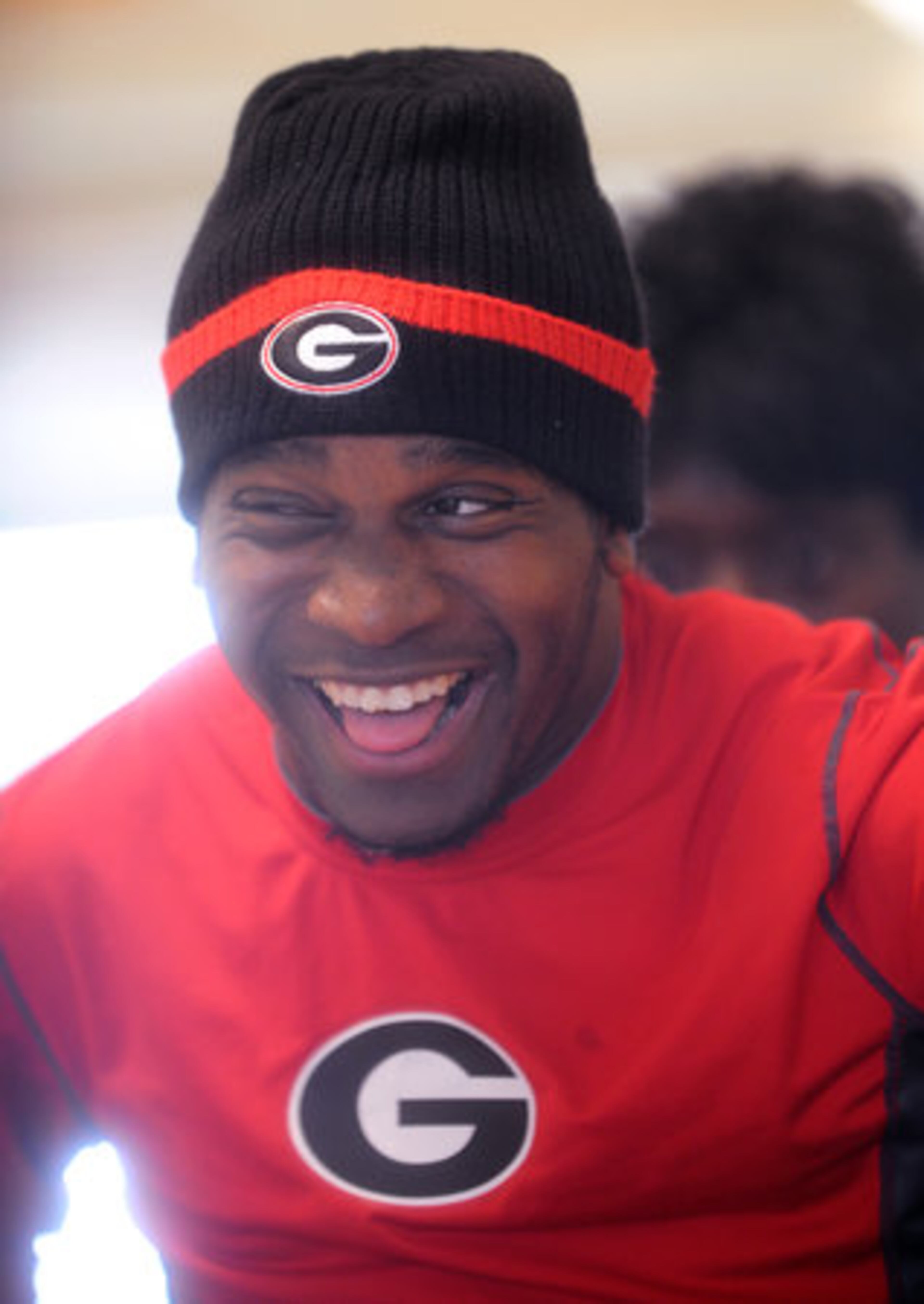 Georgia outfielder Johnathan Taylor, paralyzed in a collision with a teammate during a game in March, cracks a joke during rehab at the Shepherd Center in Atlanta.