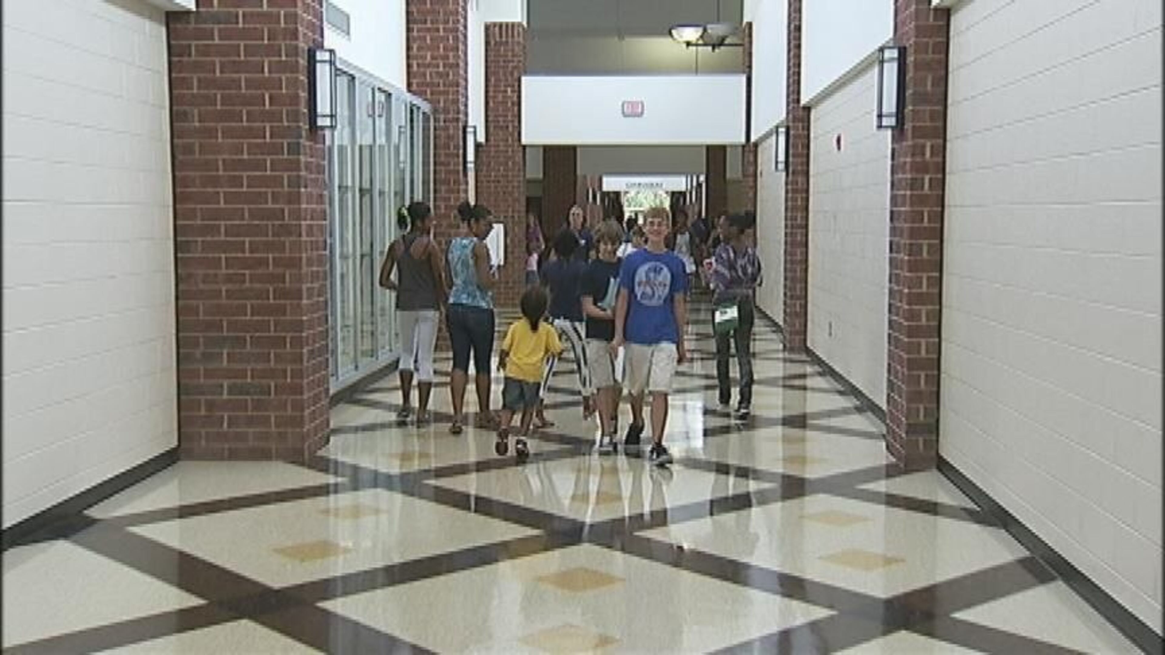 Students arrive for the first day of classes at Lake City Elementary in Morrow on Aug. 2, 2021. (Steve Schaefer for the Atlanta Journal-Constitution)