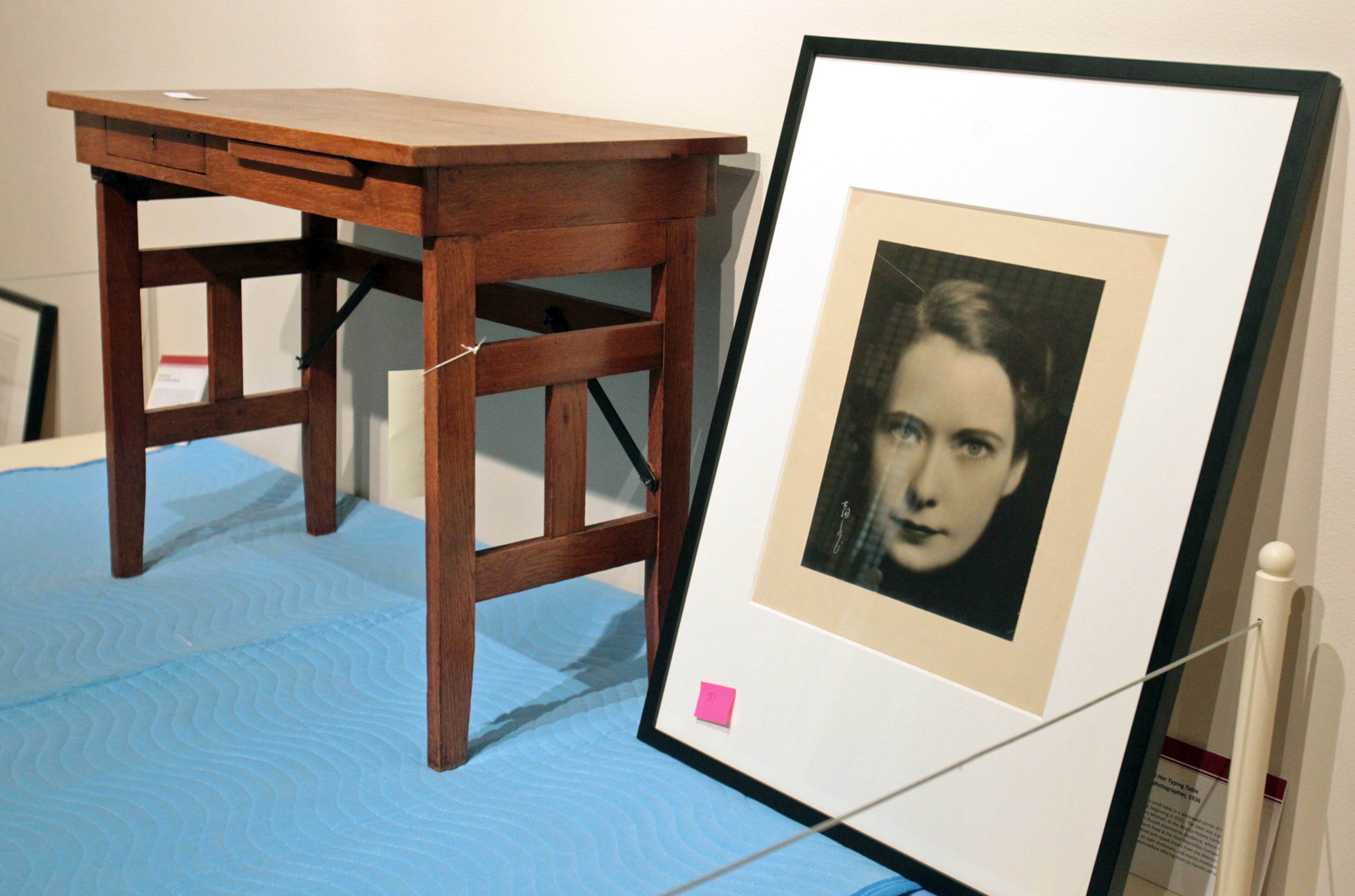 In the front of the Margaret Mitchell "lost" Gone with the Wind manuscript exhibit a portrait of her and her desk are shown before the opening of the exhibit at the Atlanta History Center Tuesday afternoon in Atlanta, Ga., May 25, 2011. Jason Getz jgetz@ajc.com